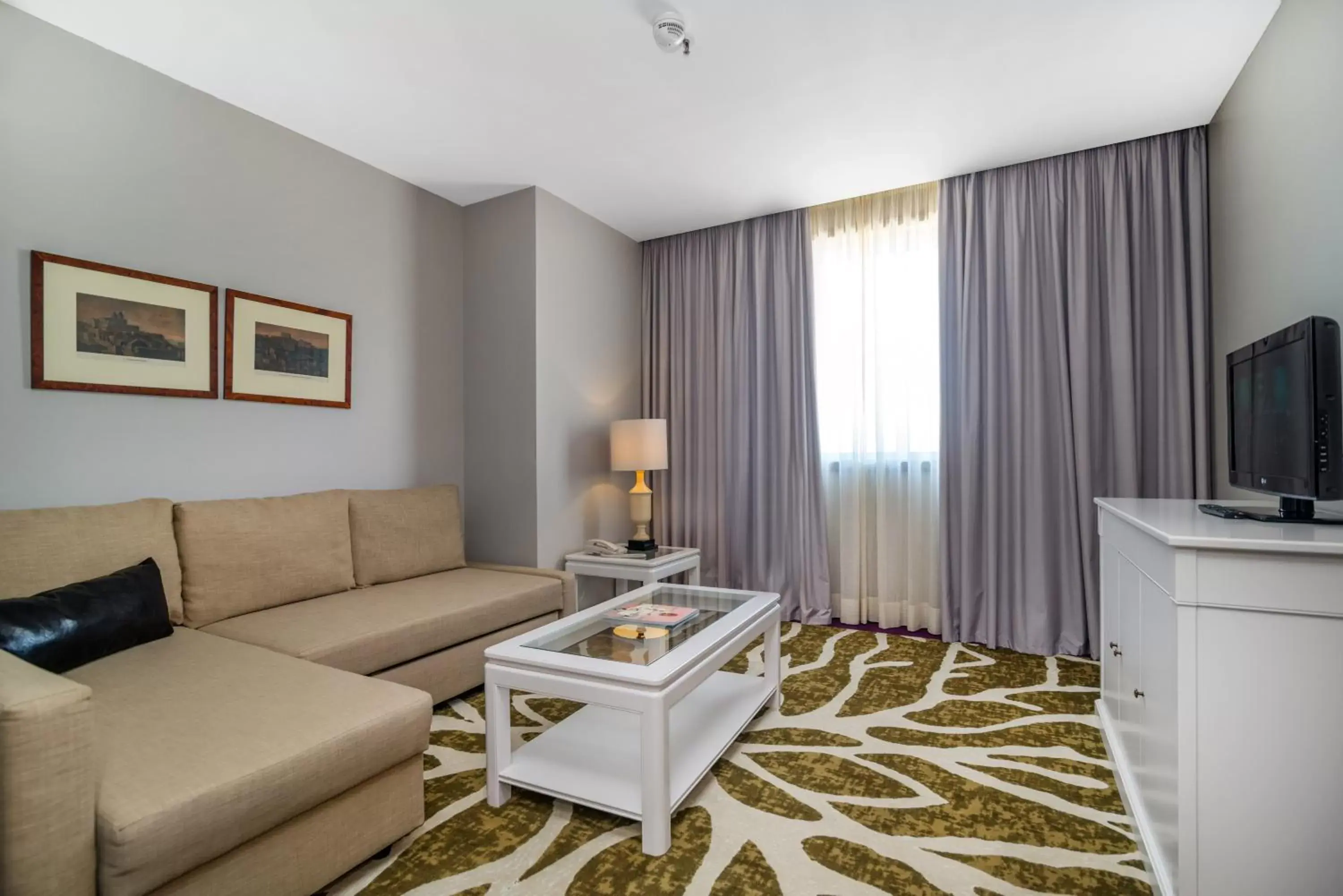 Living room, Seating Area in Holiday Inn Porto Gaia, an IHG Hotel