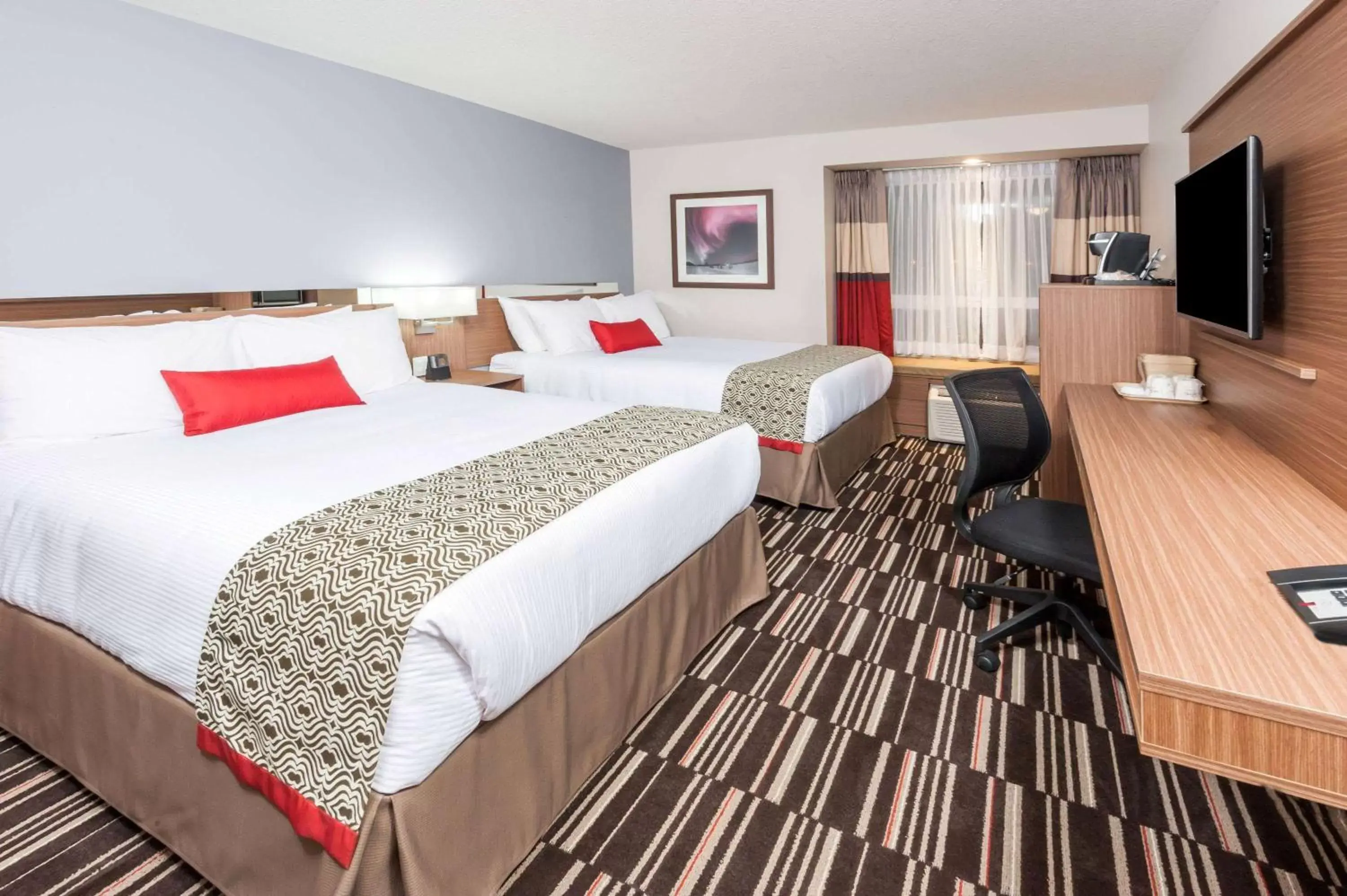 Photo of the whole room, Bed in Microtel Inn & Suites by Wyndham Fort Saint John