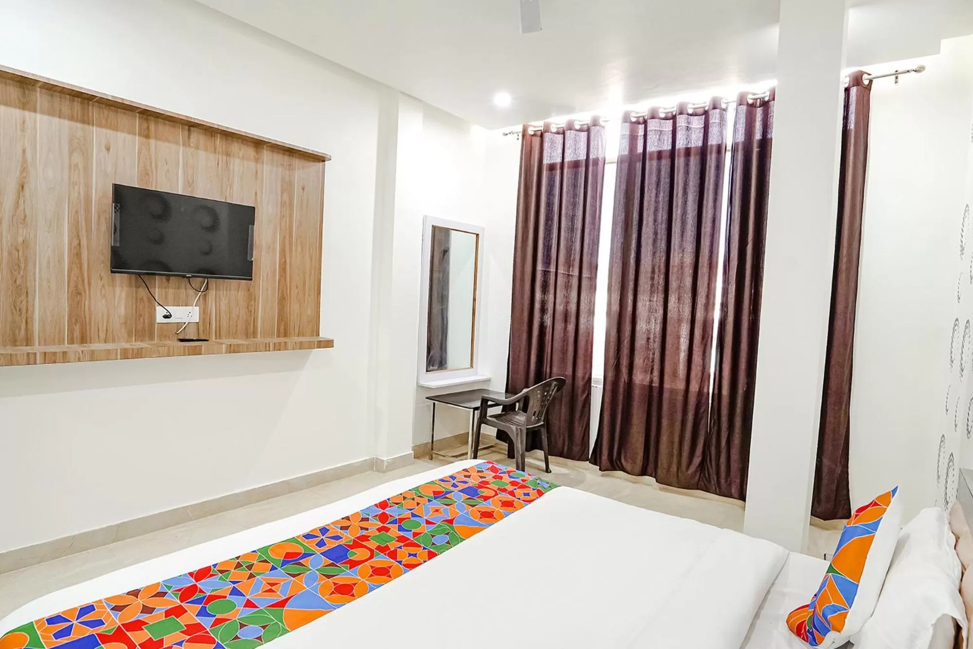 Bed in FabHotel Siddhi