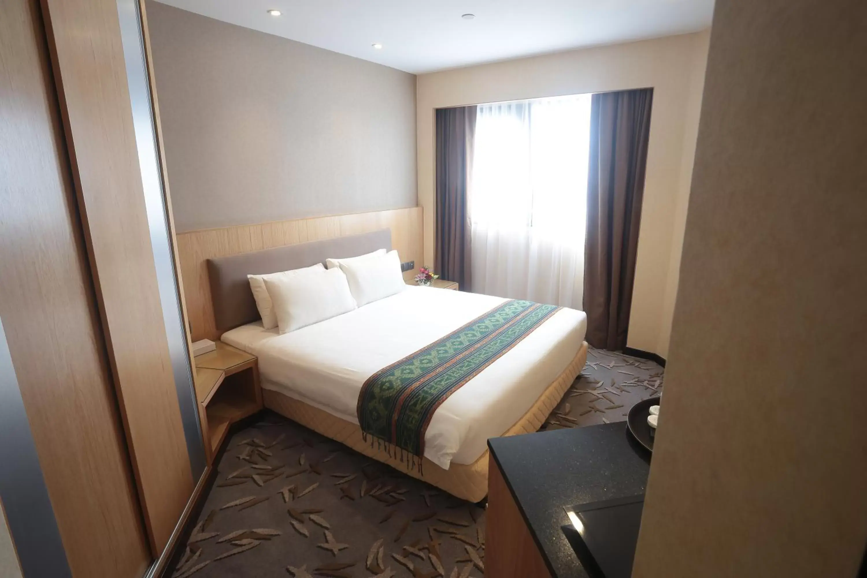 Photo of the whole room, Bed in Imperial Riverbank Hotel Kuching