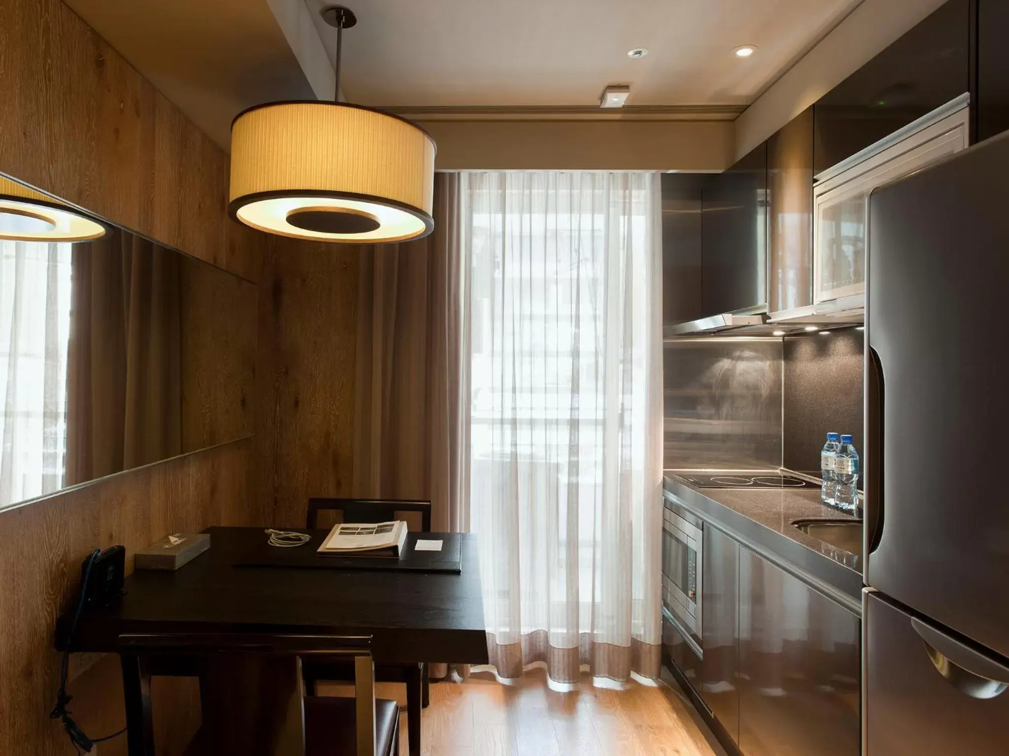 Kitchen or kitchenette in Gloria Residence