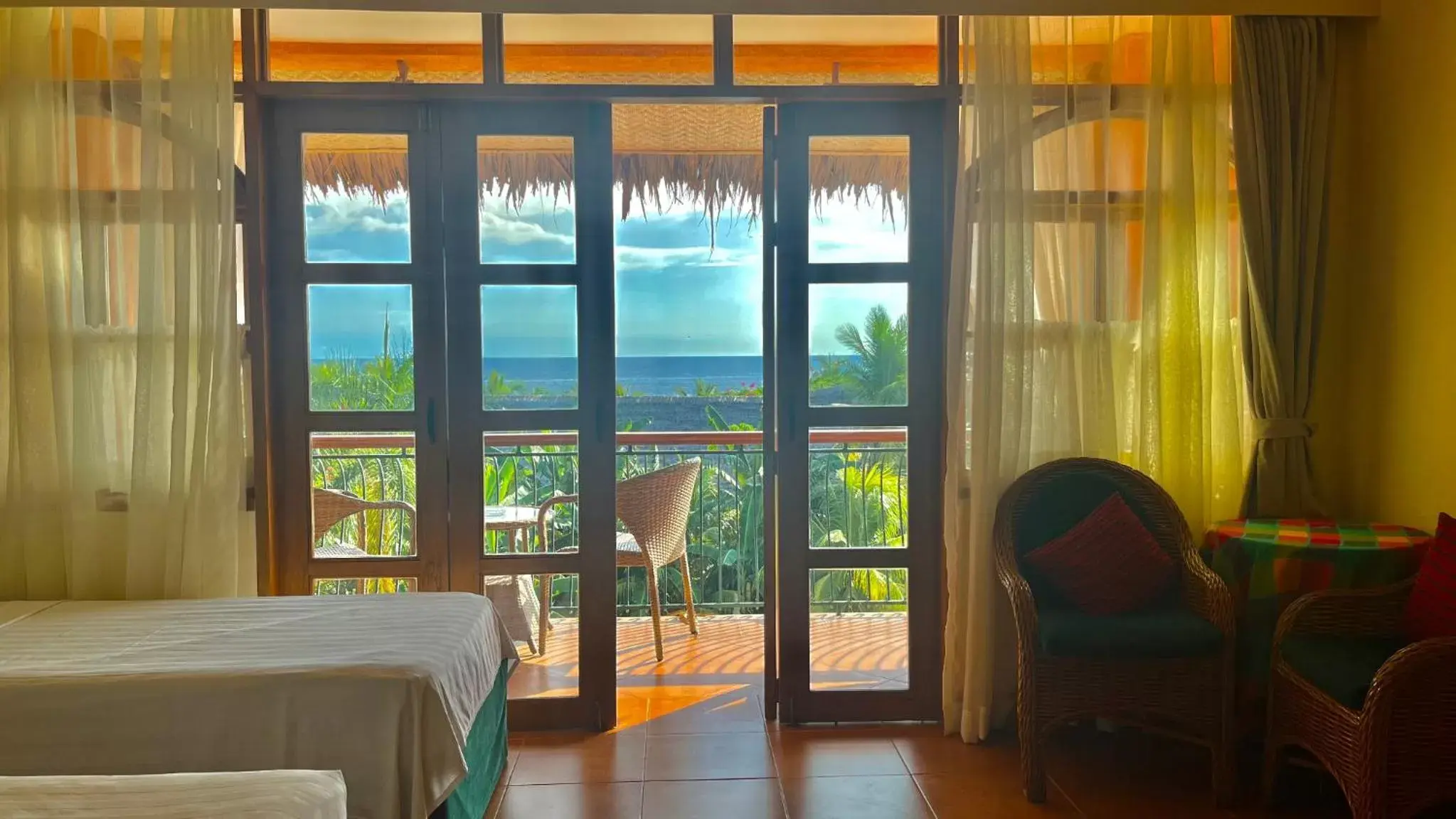 Balcony/Terrace, Bed in Coco Grove Beach Resort, Siquijor Island Balcony/Terrace, Bed in Coco Grove Beach Resort, Siquijor Island