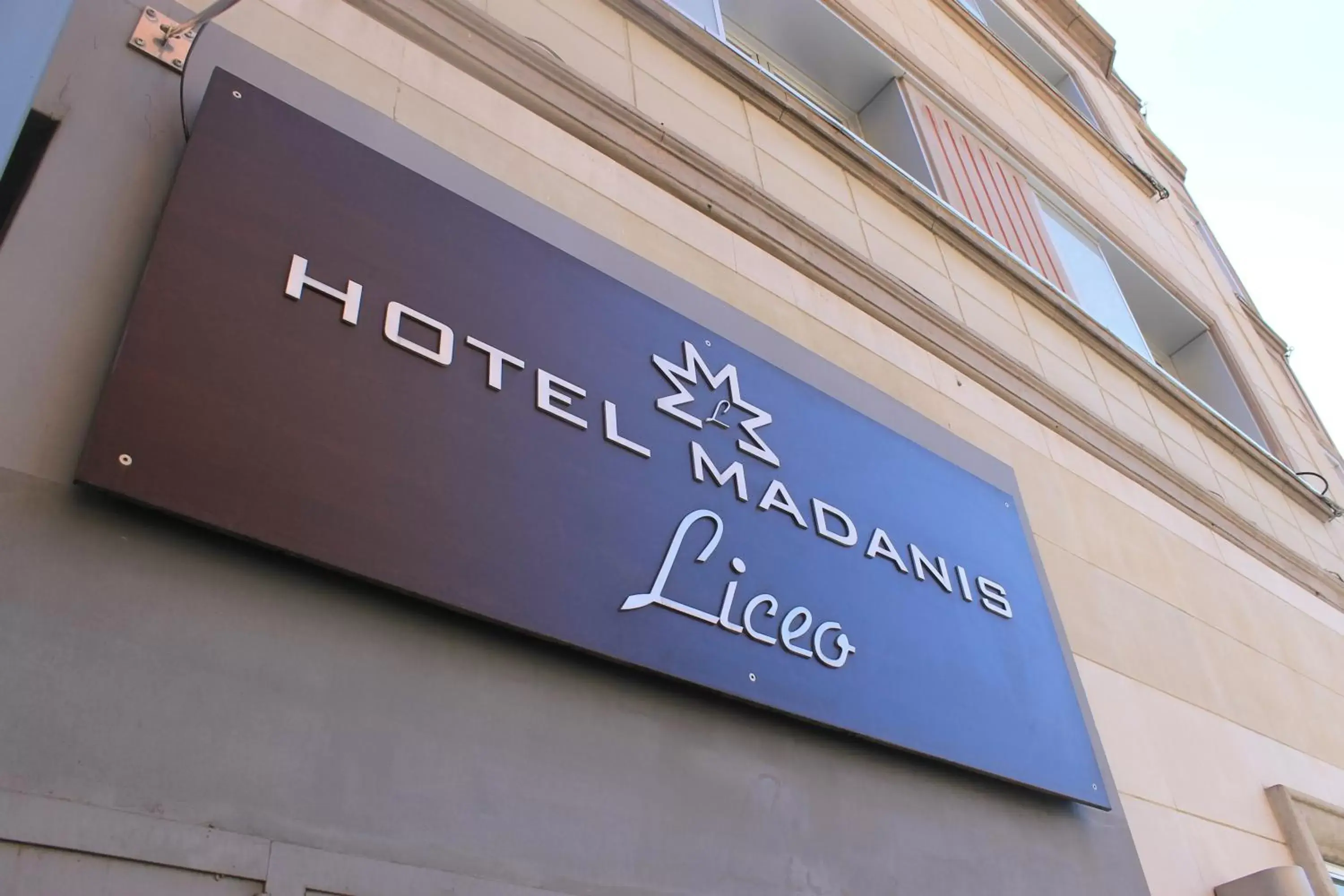 Property logo or sign in Hotel Madanis Liceo