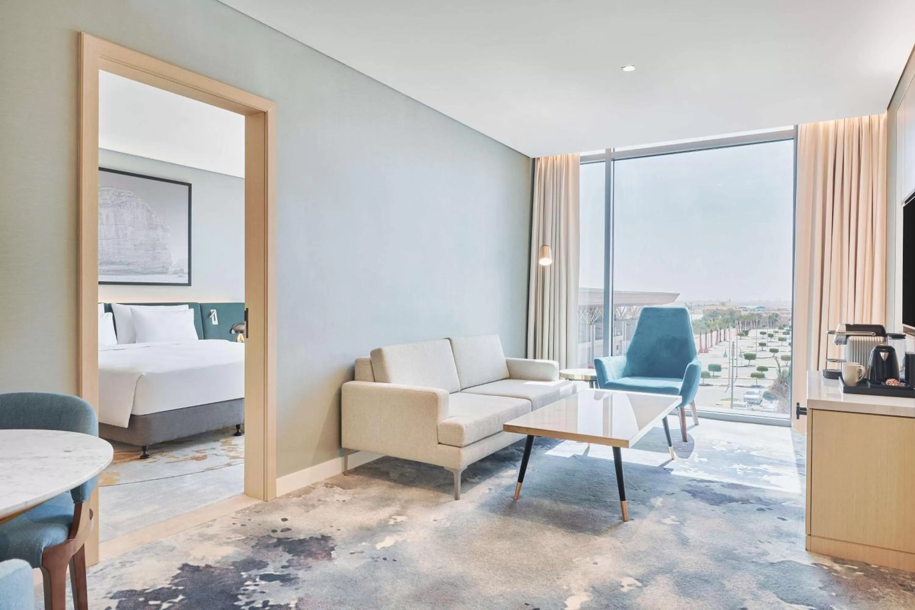 View (from property/room), Bed in Radisson Blu Hotel Riyadh Convention and Exhibition Center