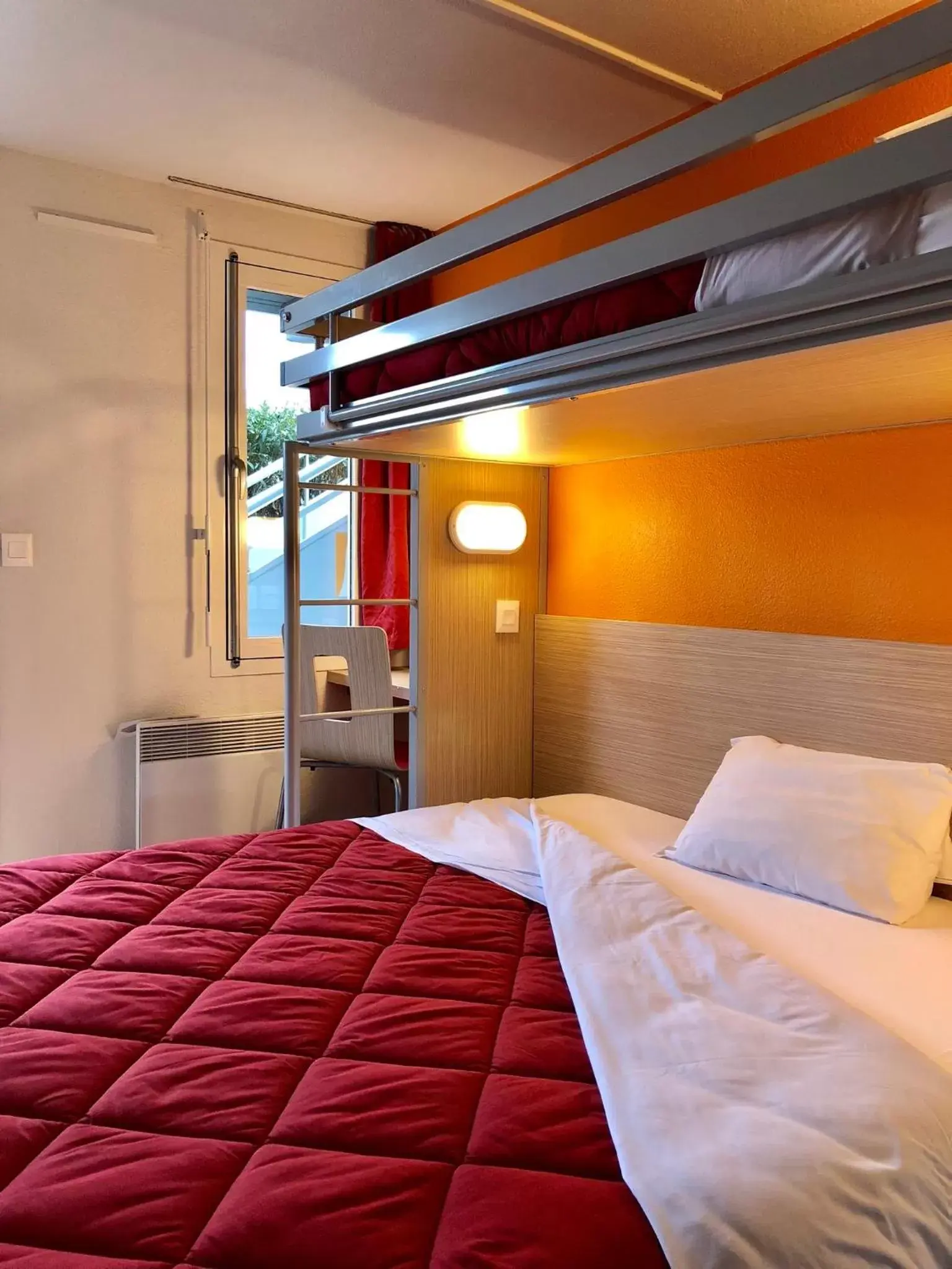 Photo of the whole room, Bunk Bed in Premiere Classe Perpignan Sud