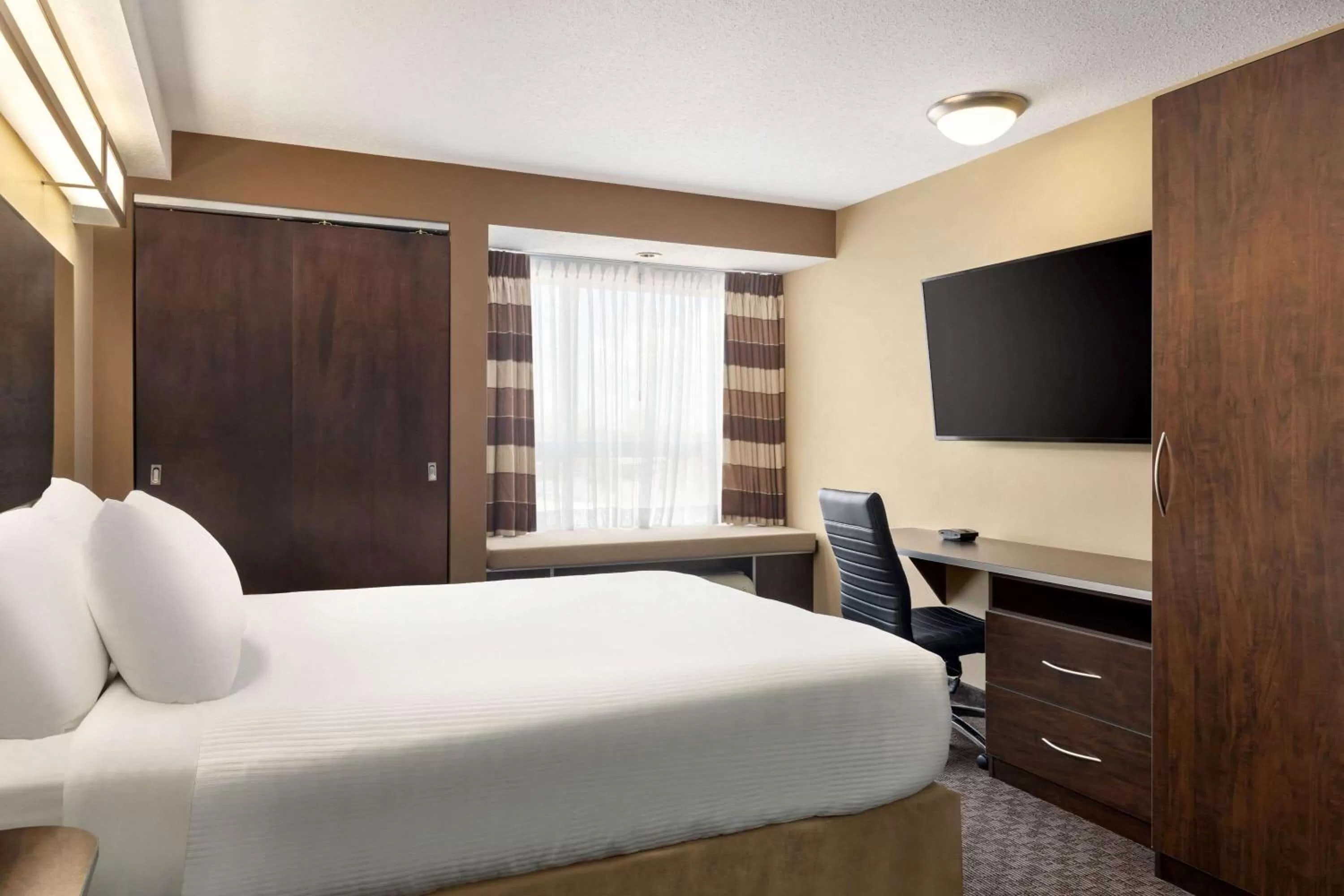 Photo of the whole room, Bed in Microtel Inn & Suites by Wyndham Estevan
