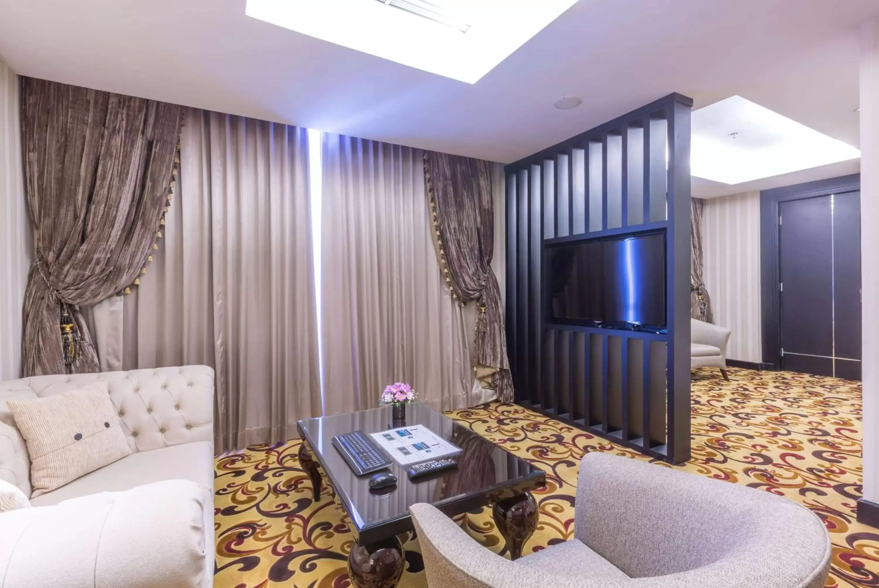 Photo of the whole room, TV/Entertainment Center in Wyndham Surabaya