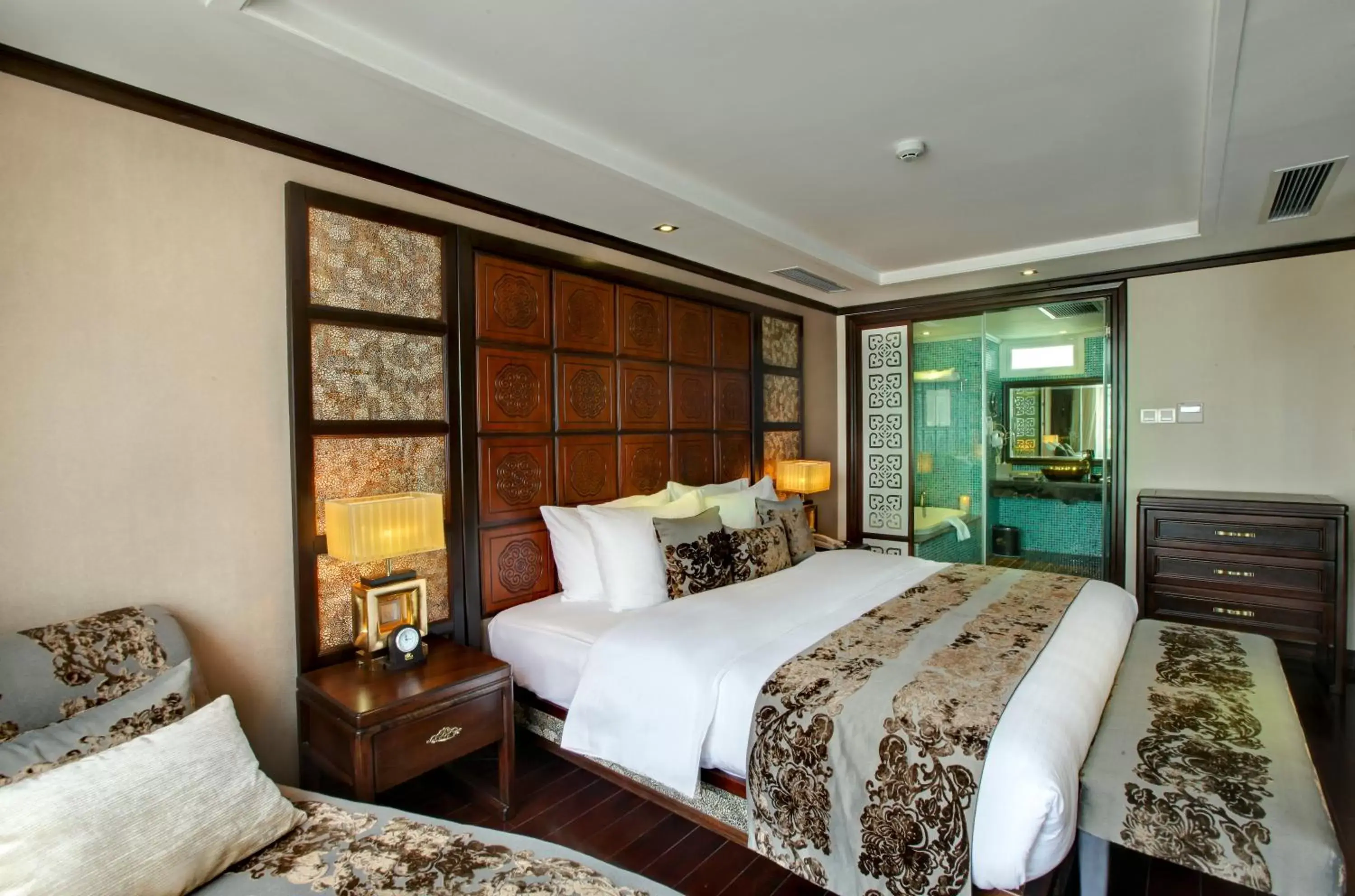 Bed in Golden Lotus Luxury Hotel