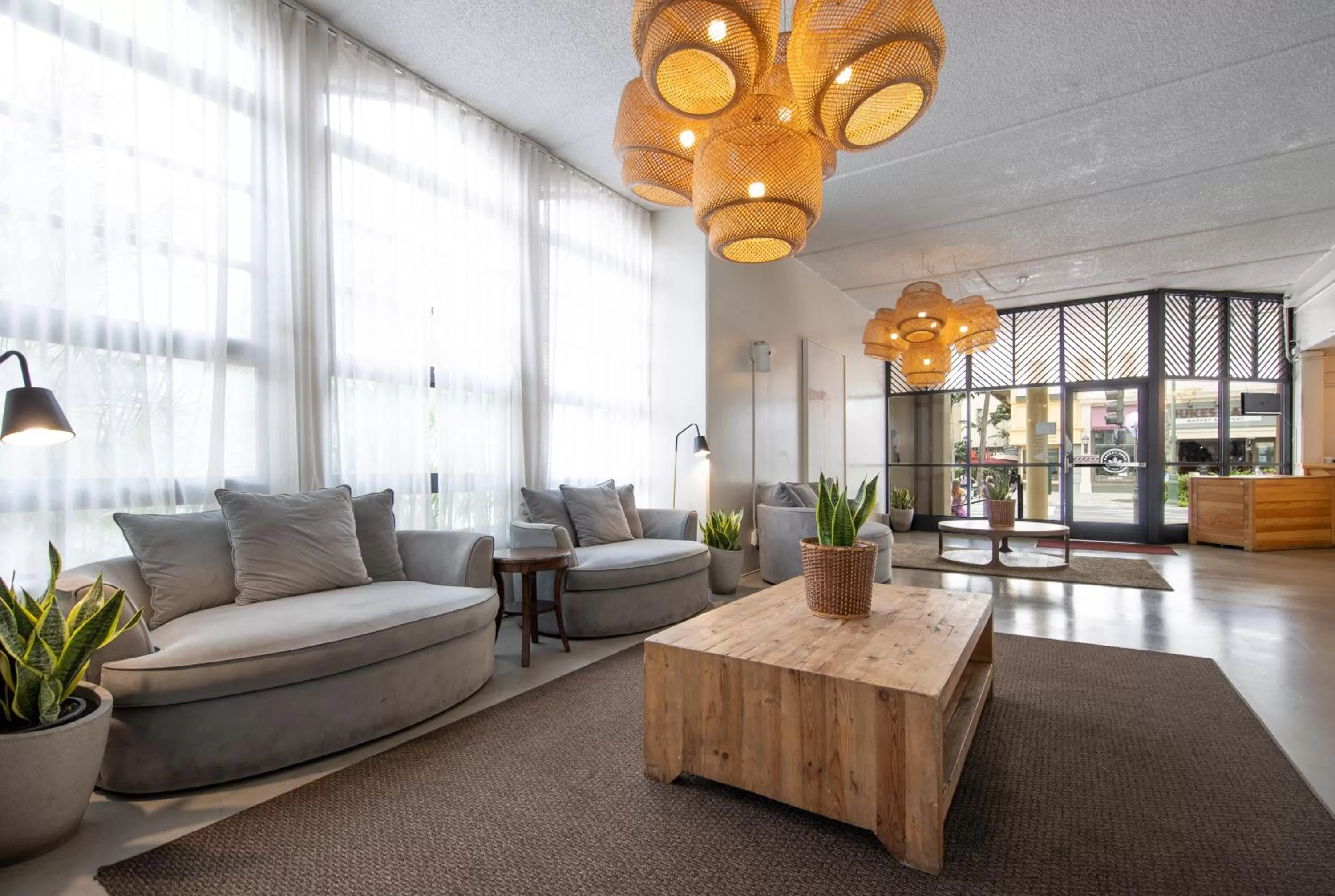 Communal lounge/ TV room in Ohia Waikiki Studio Suites