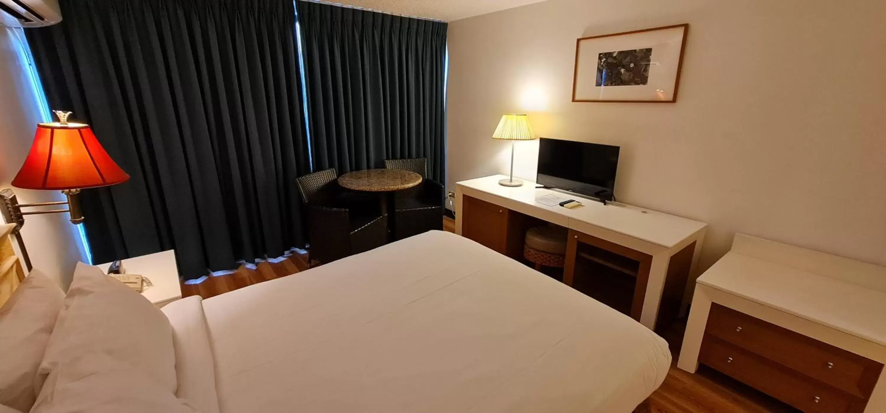Bed in SureStay Hotel by Best Western Guam Palmridge
