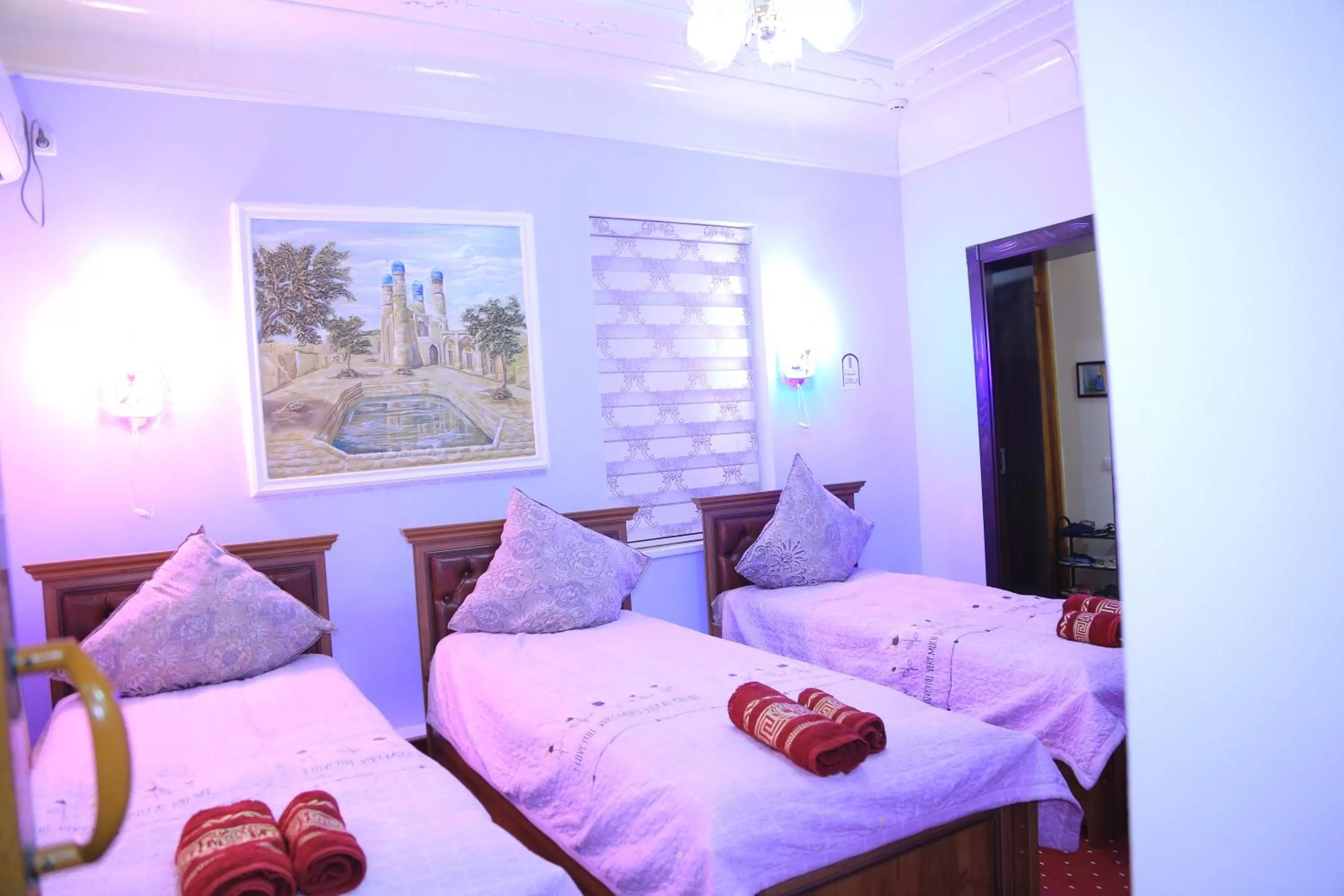 Bedroom in Alliance hotel bukhara