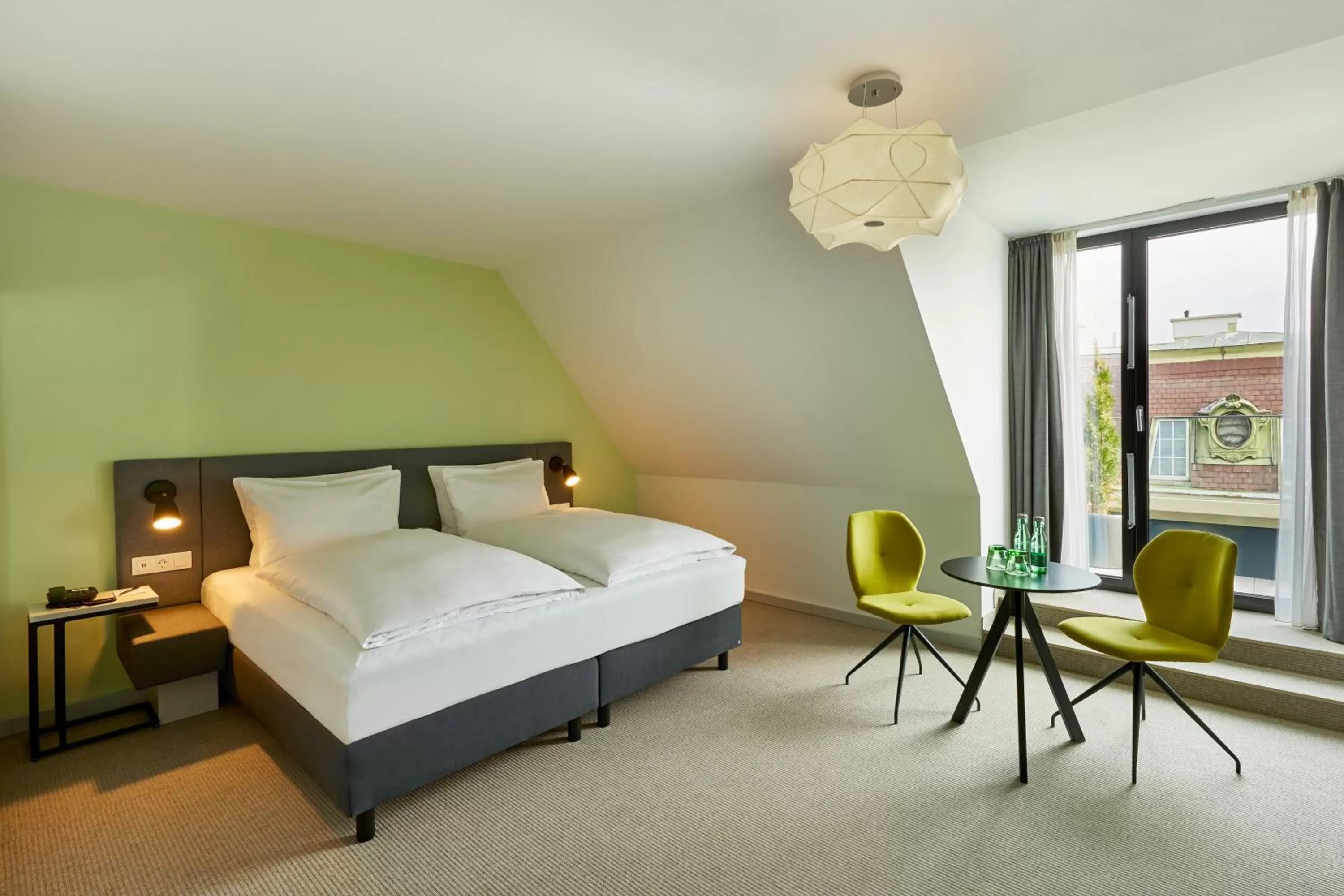 Photo of the whole room, Bed in H+ Hotel Wien