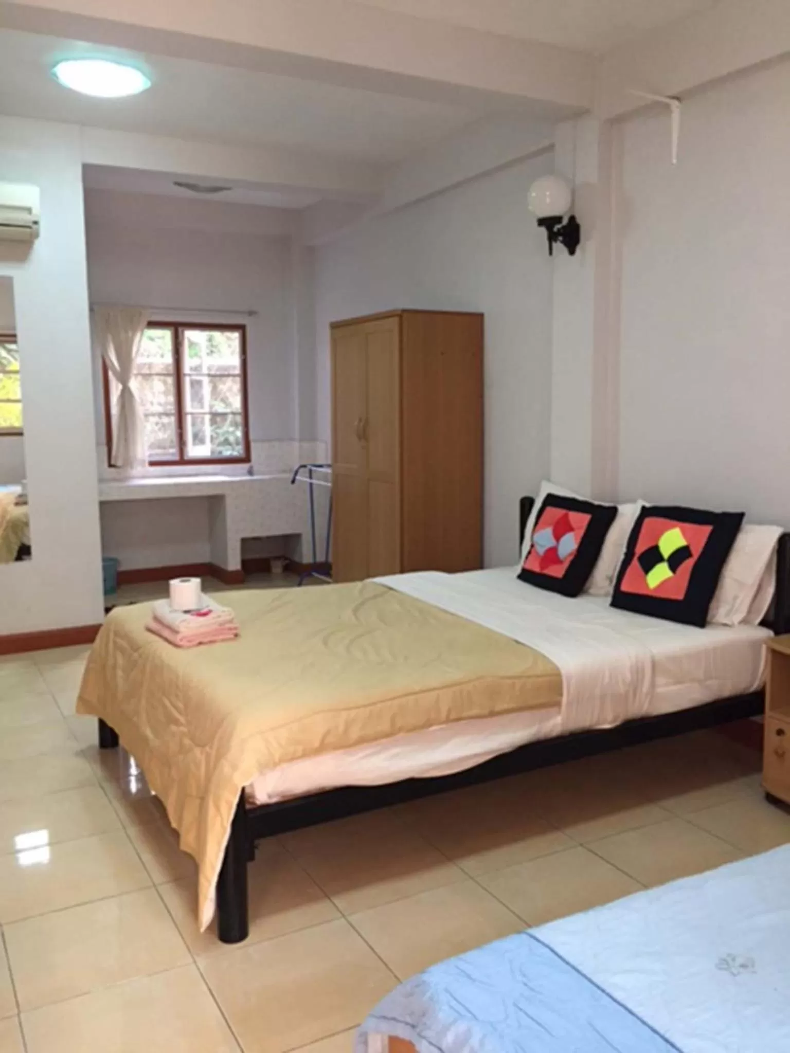 Bed in Pikul Apartment Hotel