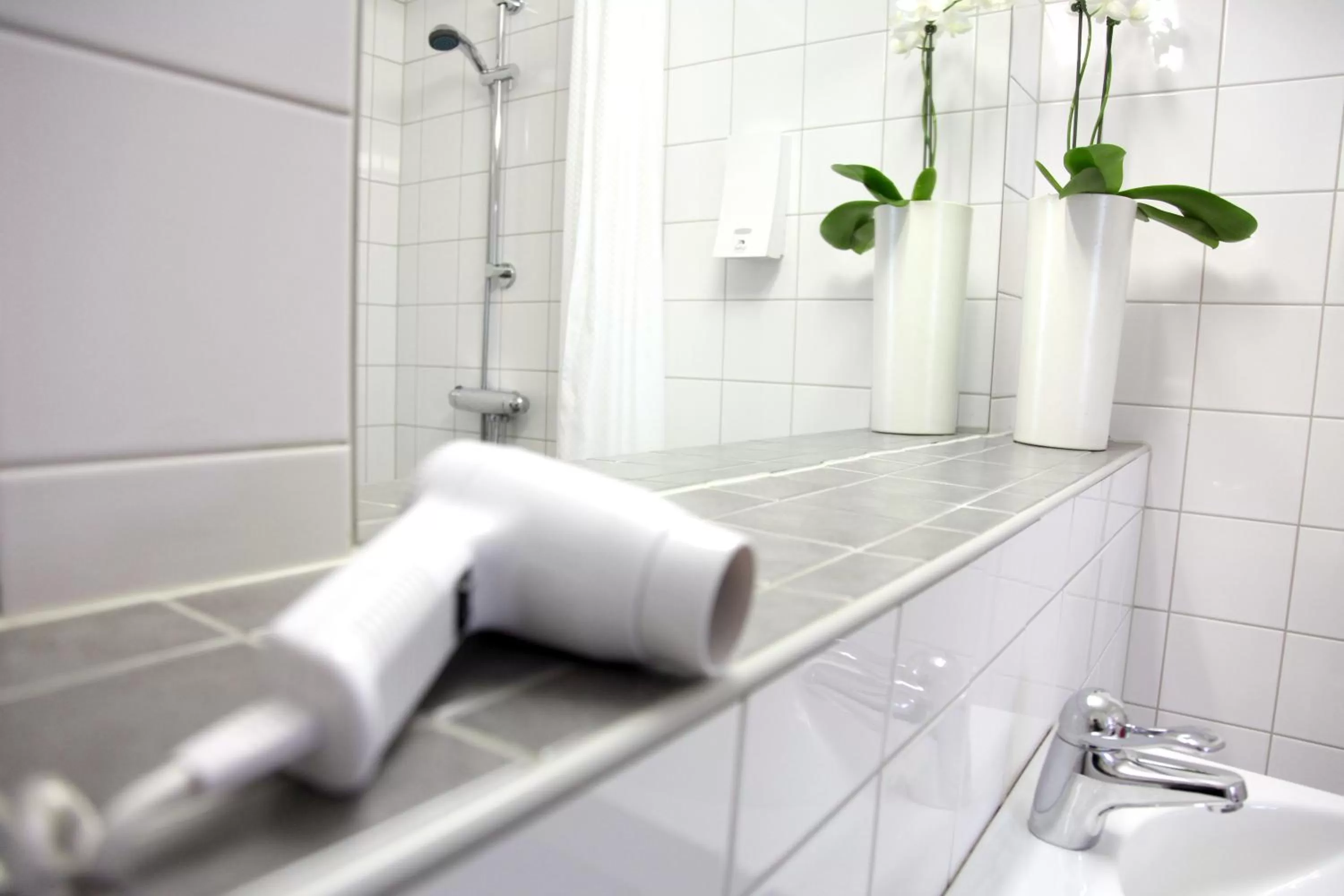 Shower in Hotell Aston