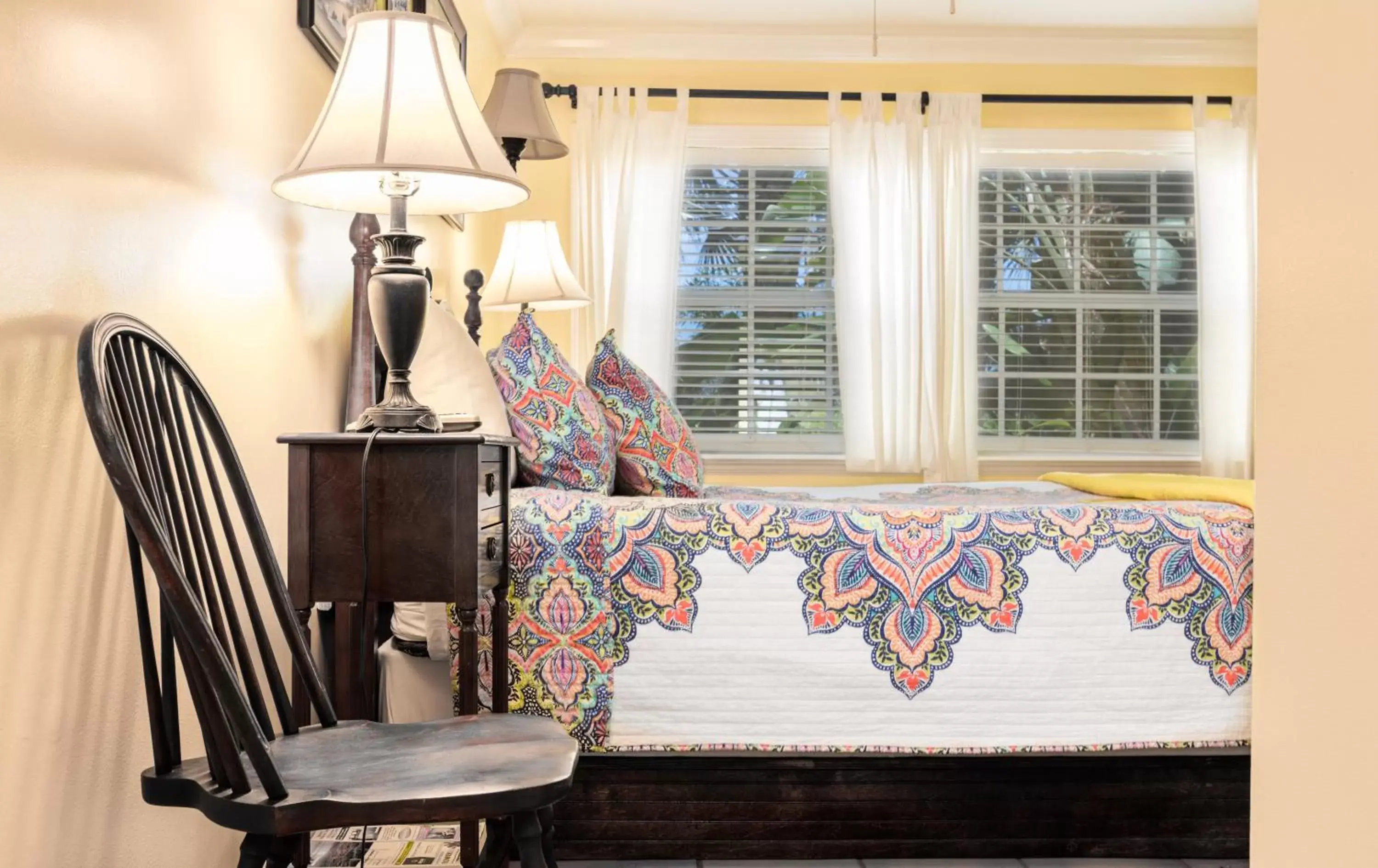 Bedroom, Seating Area in The Caribbean Court Boutique Hotel