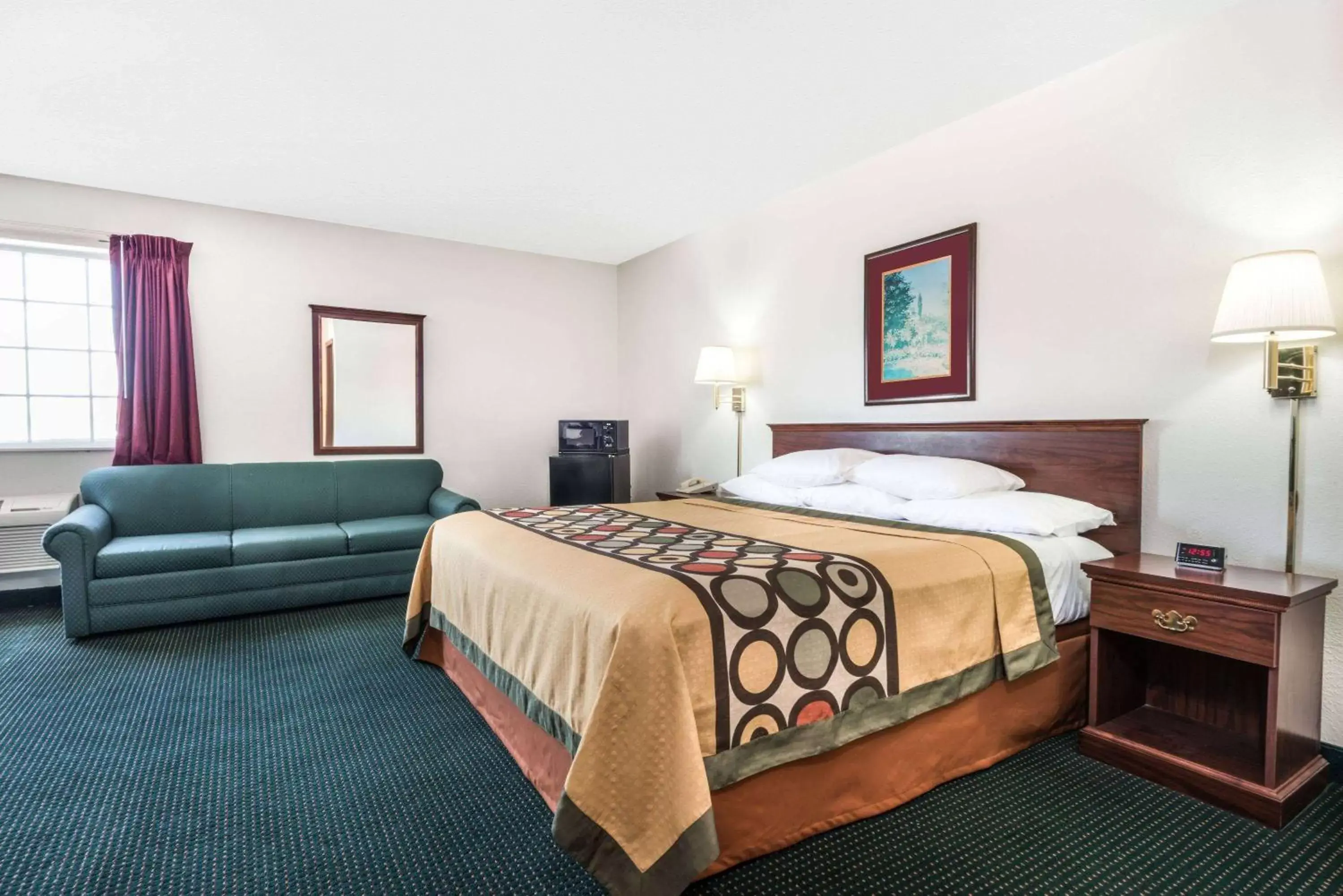 Bed in Super 8 by Wyndham Platte City Kansas City Area