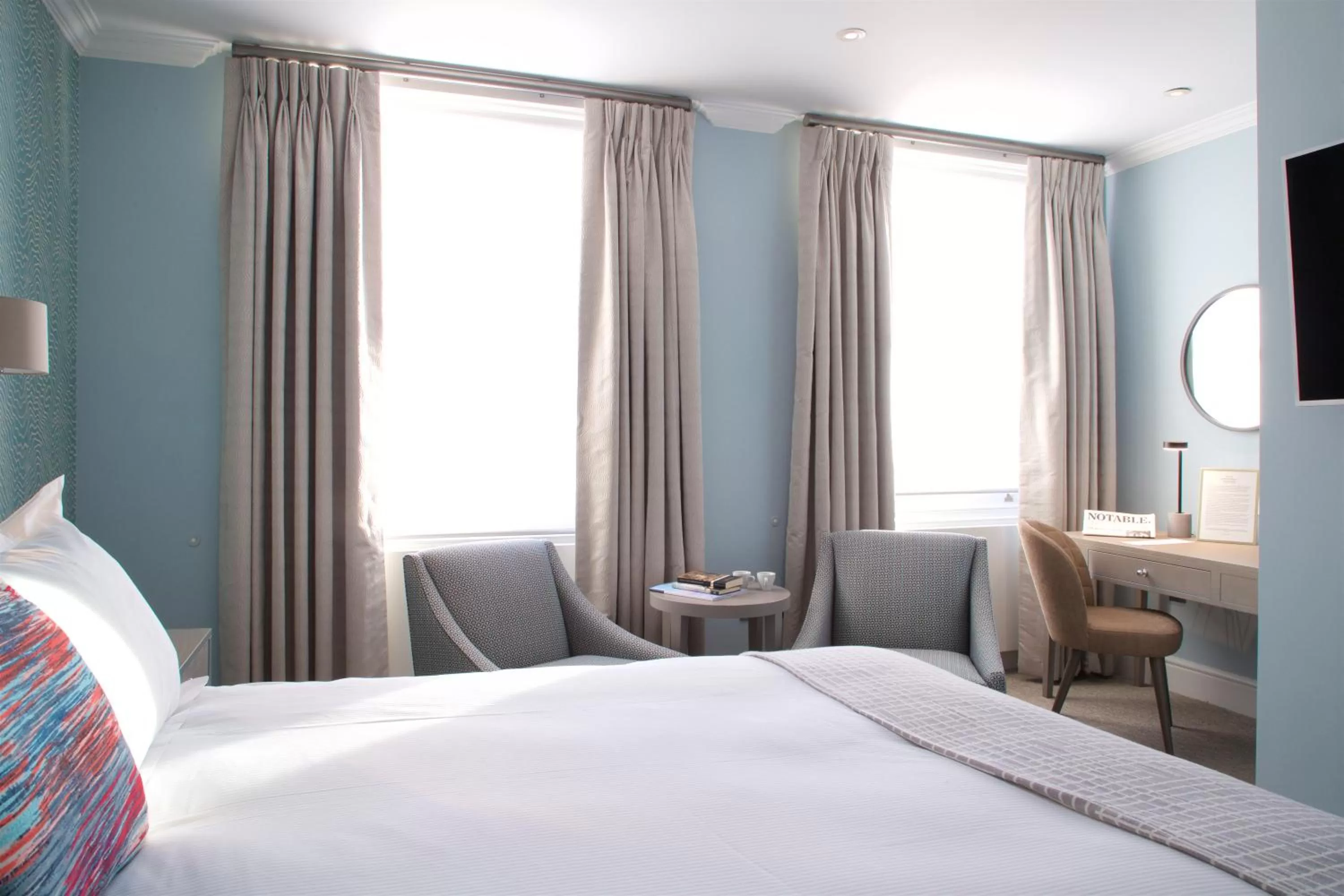 Bed in 54 Queen's Gate Hotel