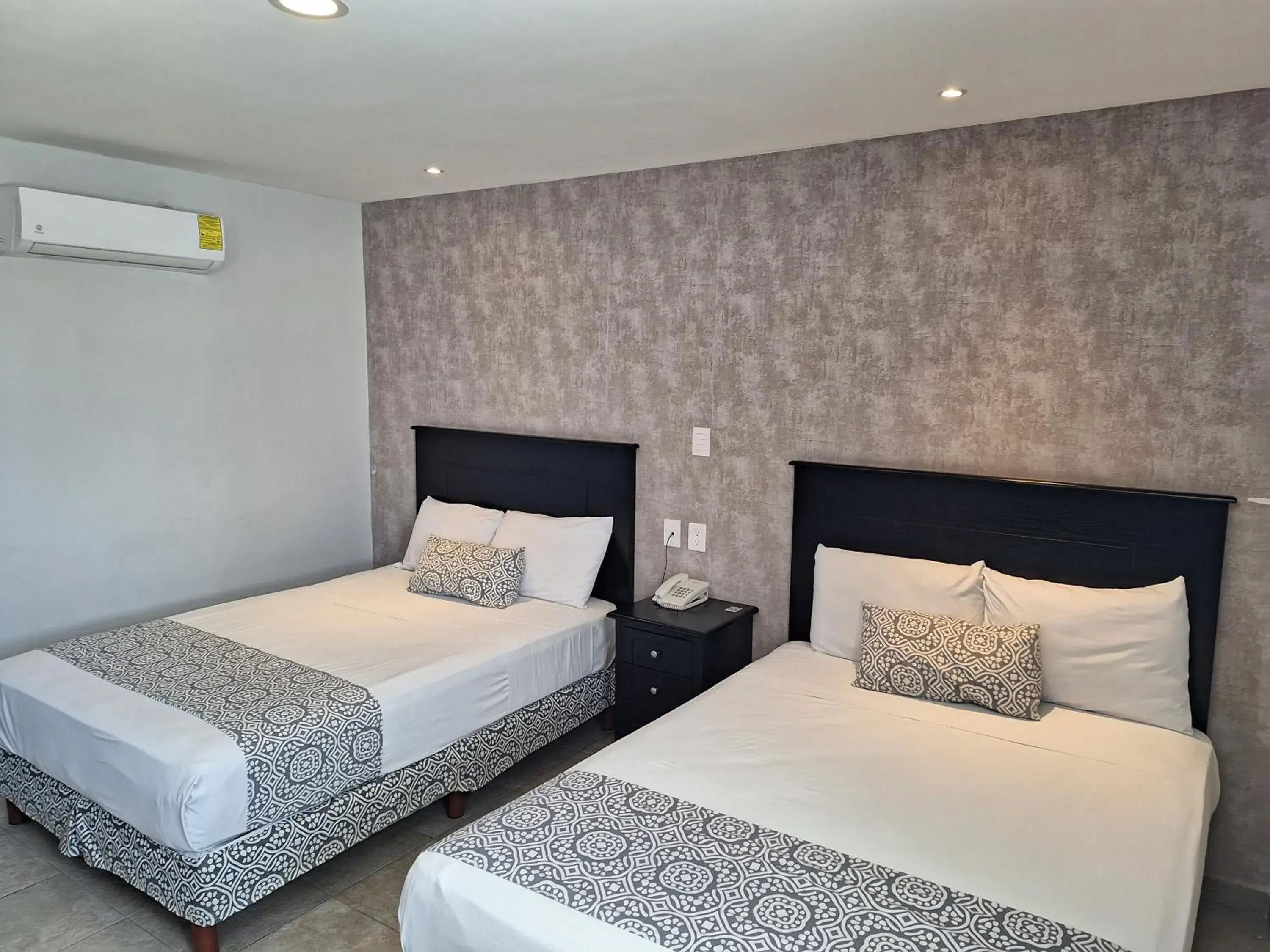 Bed in Hotel Costa Verde