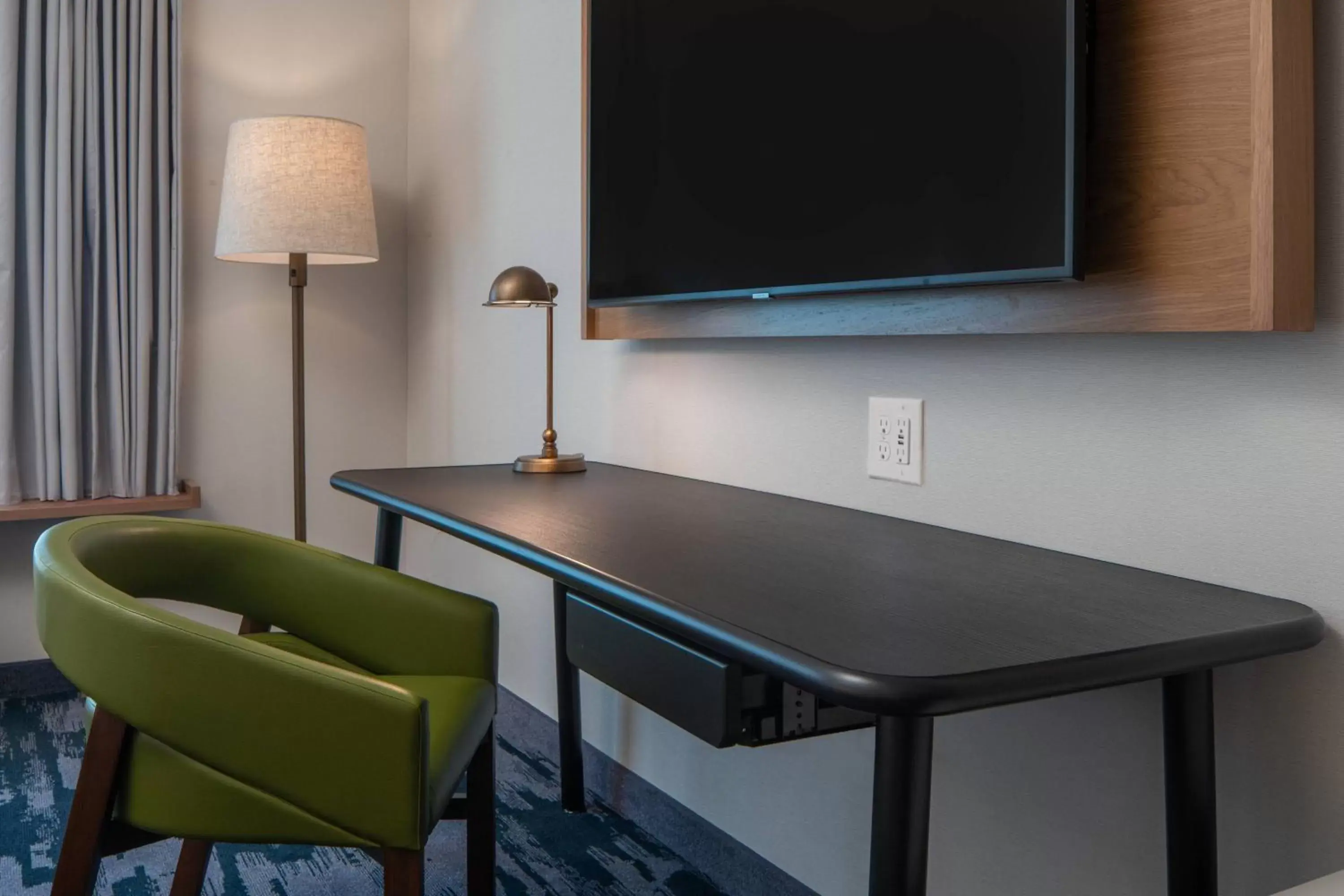 Photo of the whole room, TV/Entertainment Center in Fairfield Inn & Suites by Marriott Pensacola West I-10