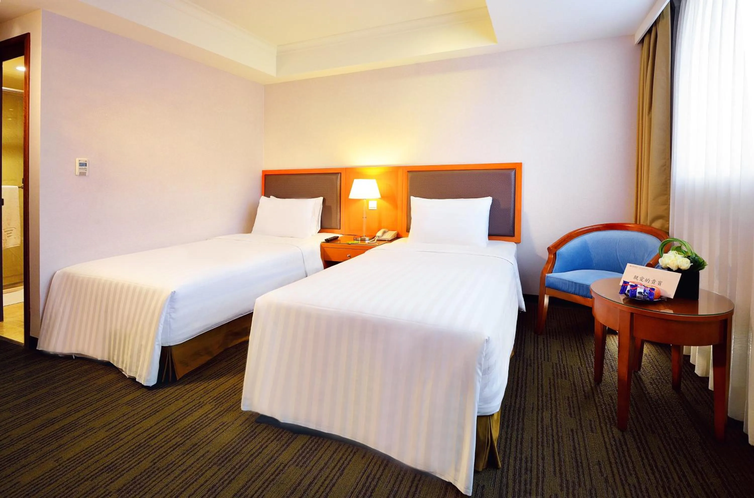 Photo of the whole room, Bed in Fuward Hotel Tainan