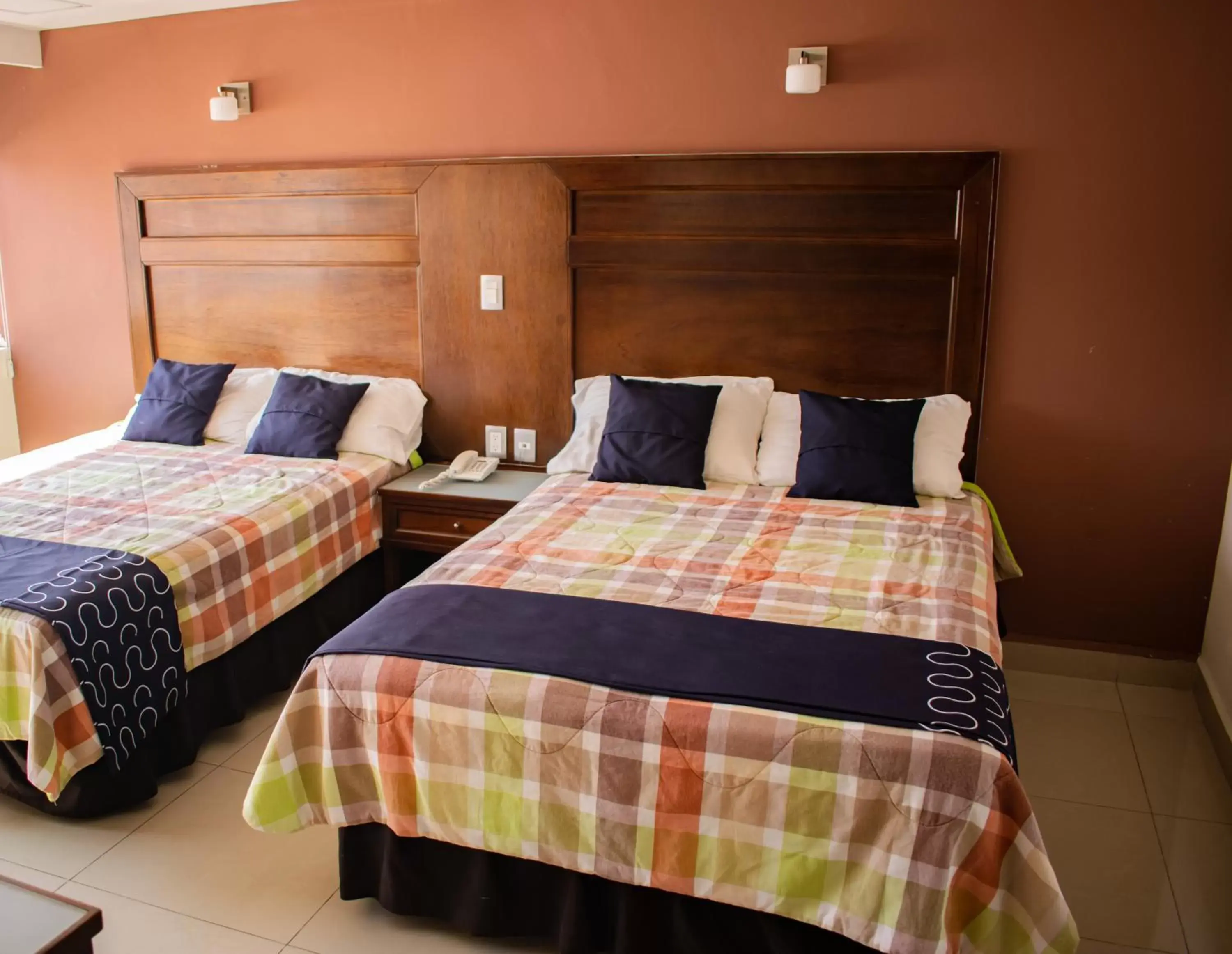 Bed in Hotel Granda Inn