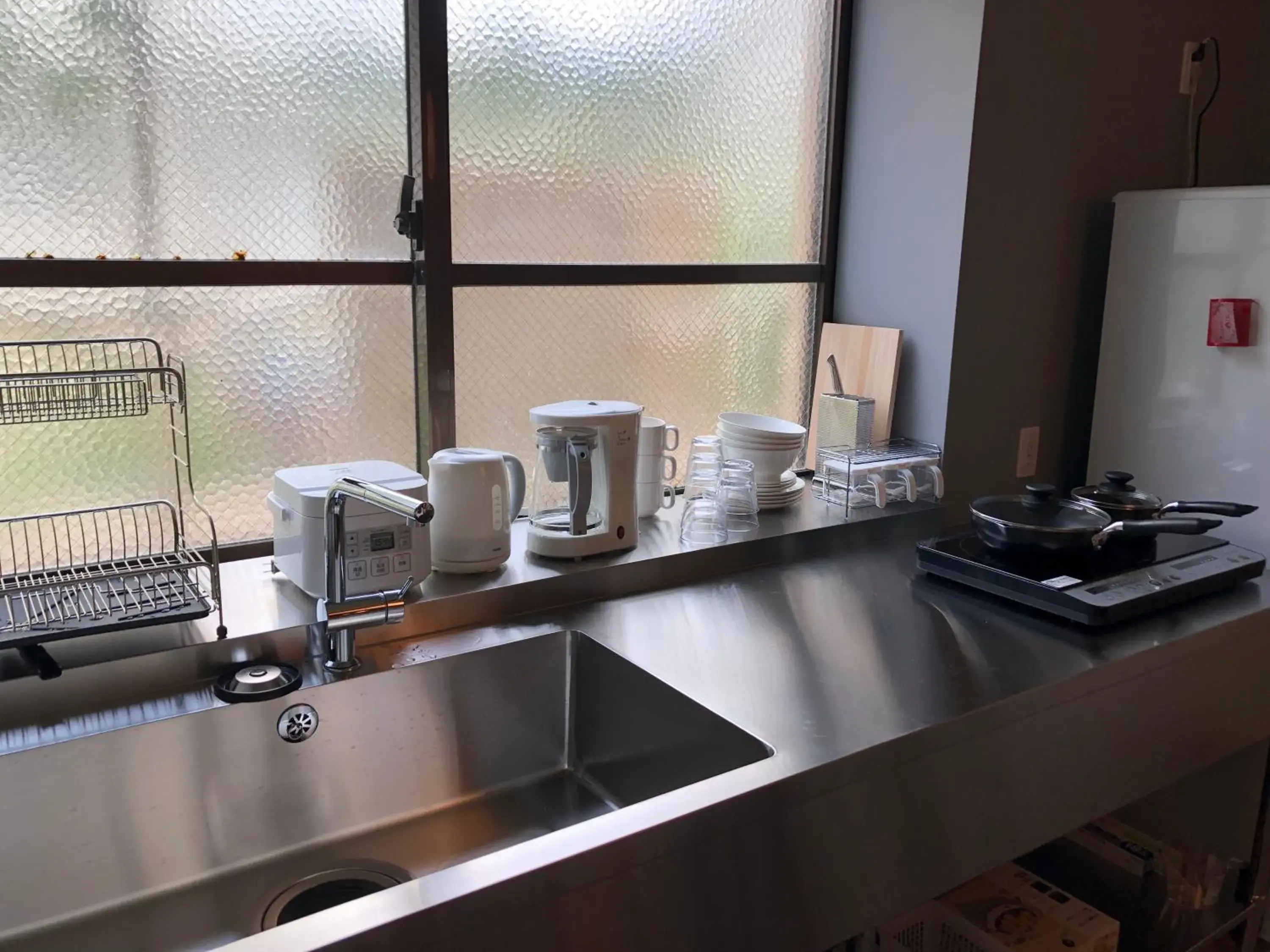 Property building in Santiago Guesthouse Naha Property building in Santiago Guesthouse Naha