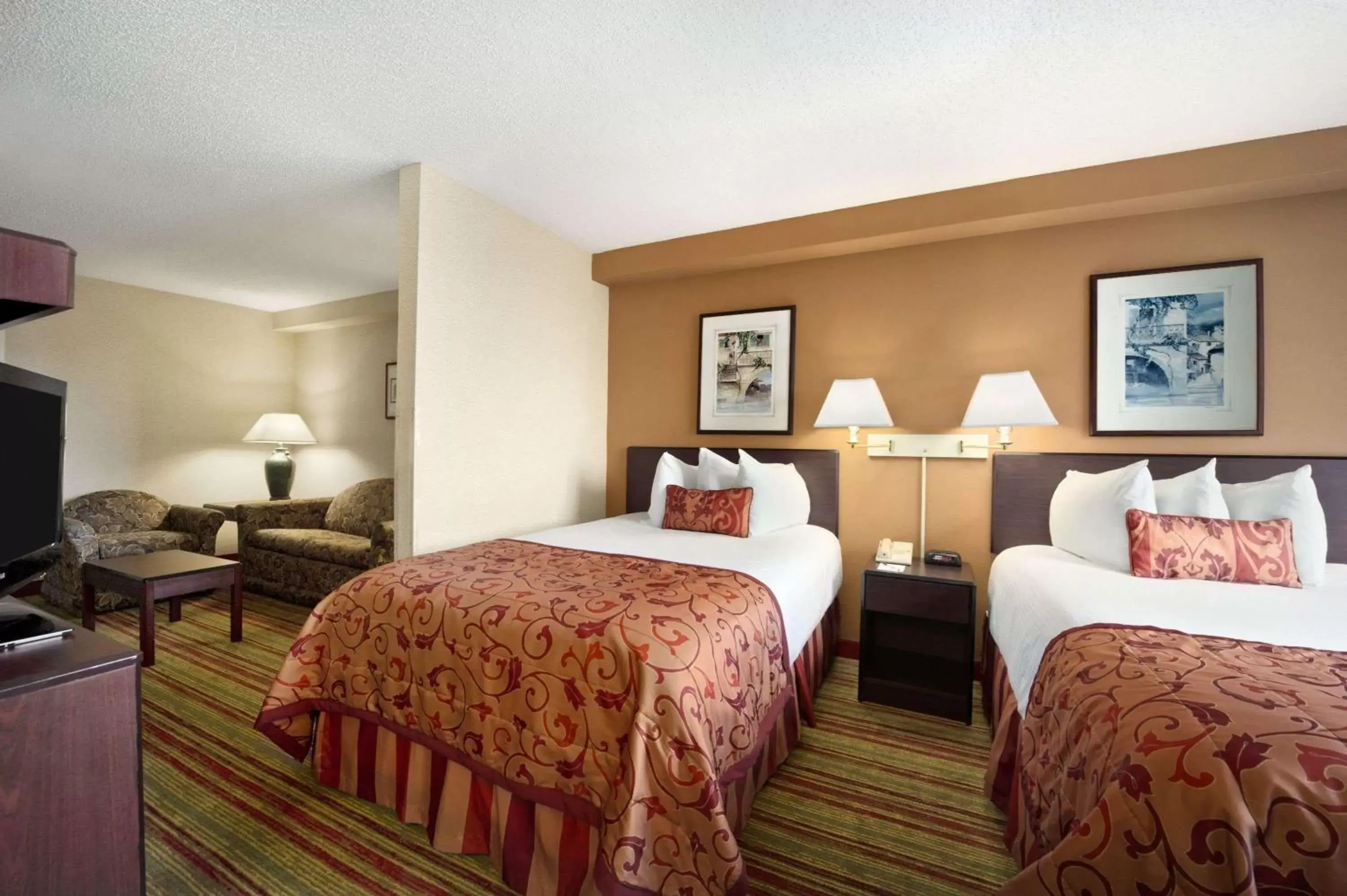 Photo of the whole room in Ramada by Wyndham Suites Orlando Airport