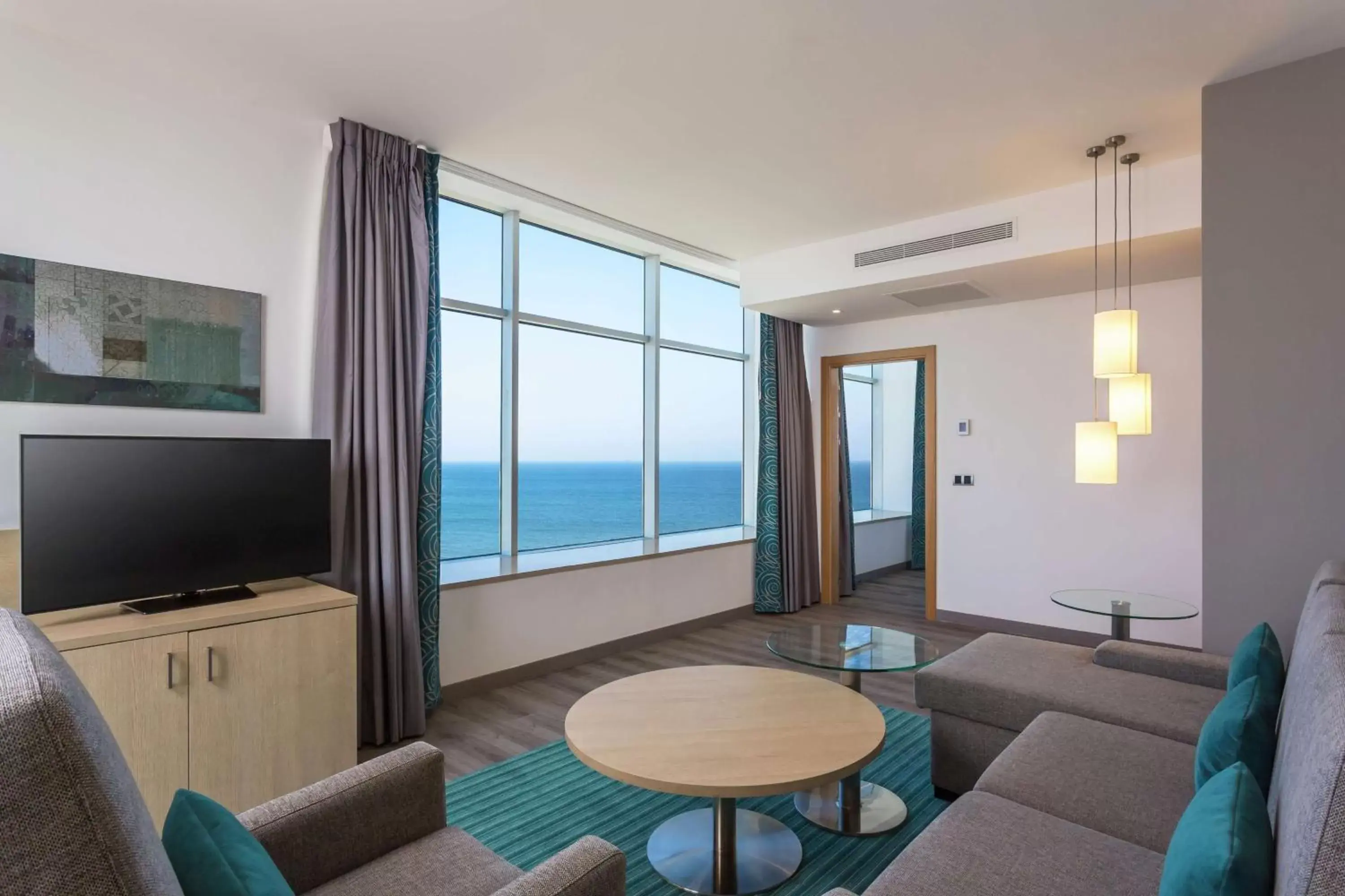 Living room, Sea View in Hilton Garden Inn Tanger City Centre