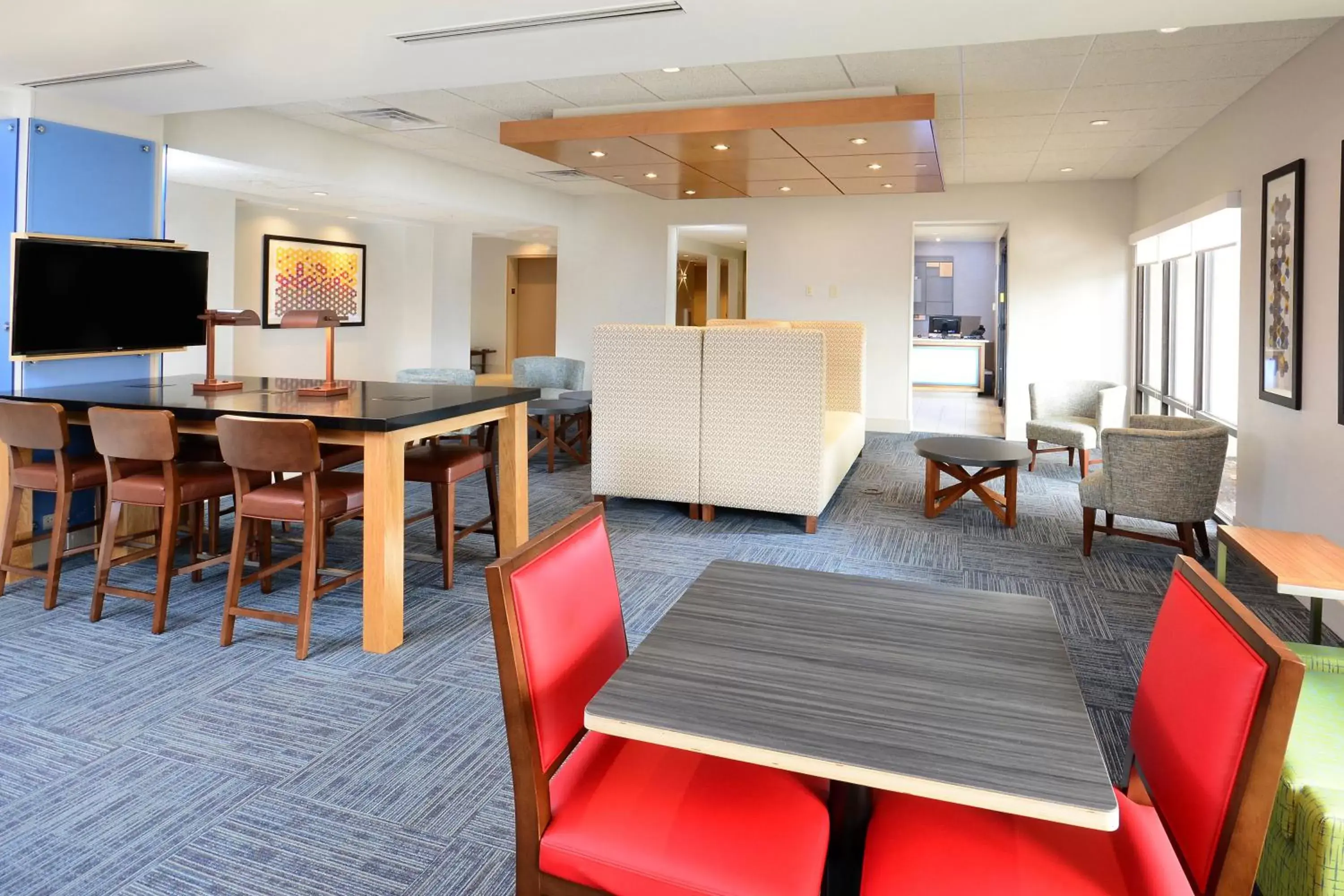 Property building, Seating Area in Holiday Inn Express & Suites Raleigh Durham Airport at RTP, an IHG Hotel