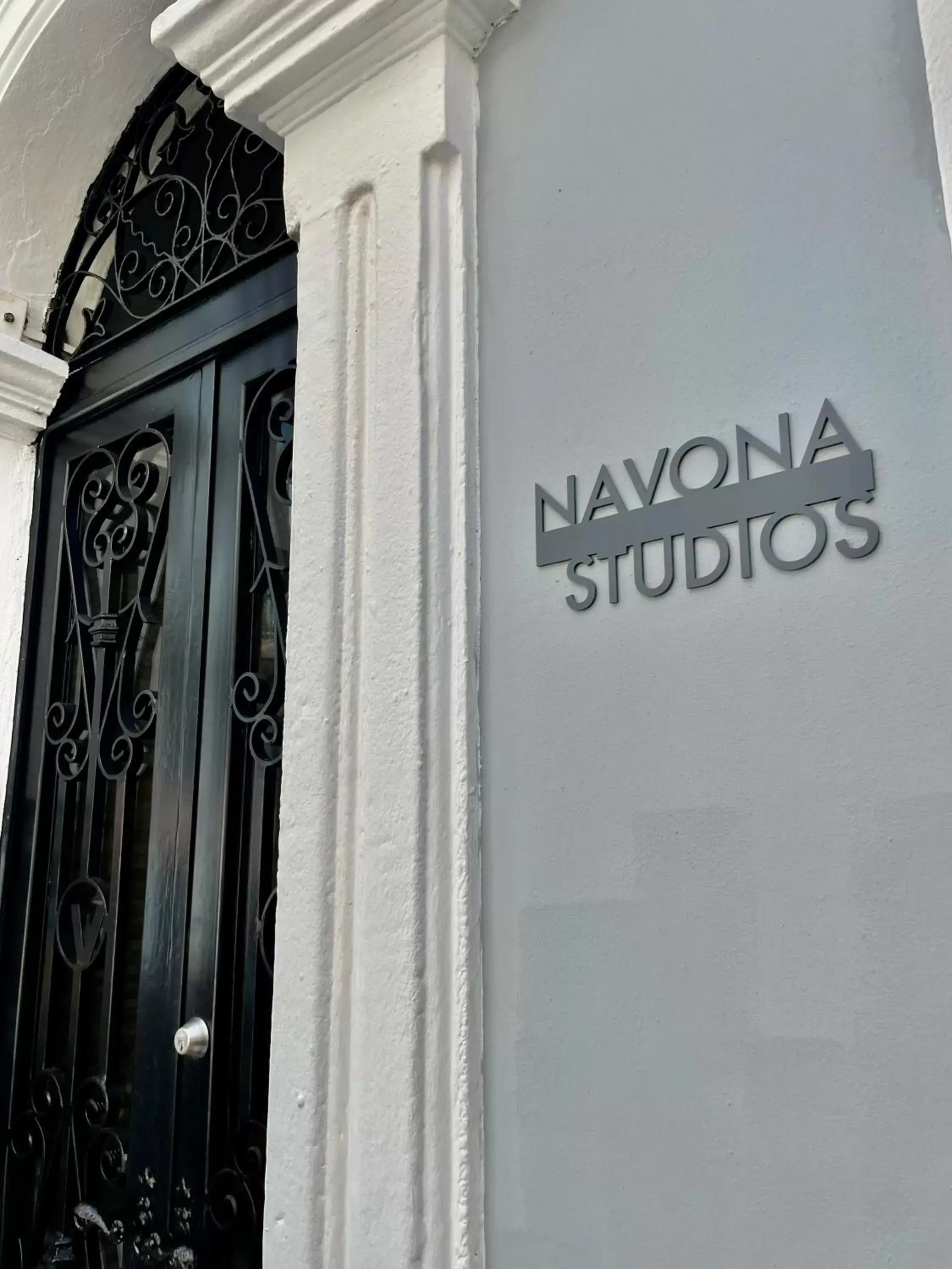 Property Logo/Sign in Navona Studios