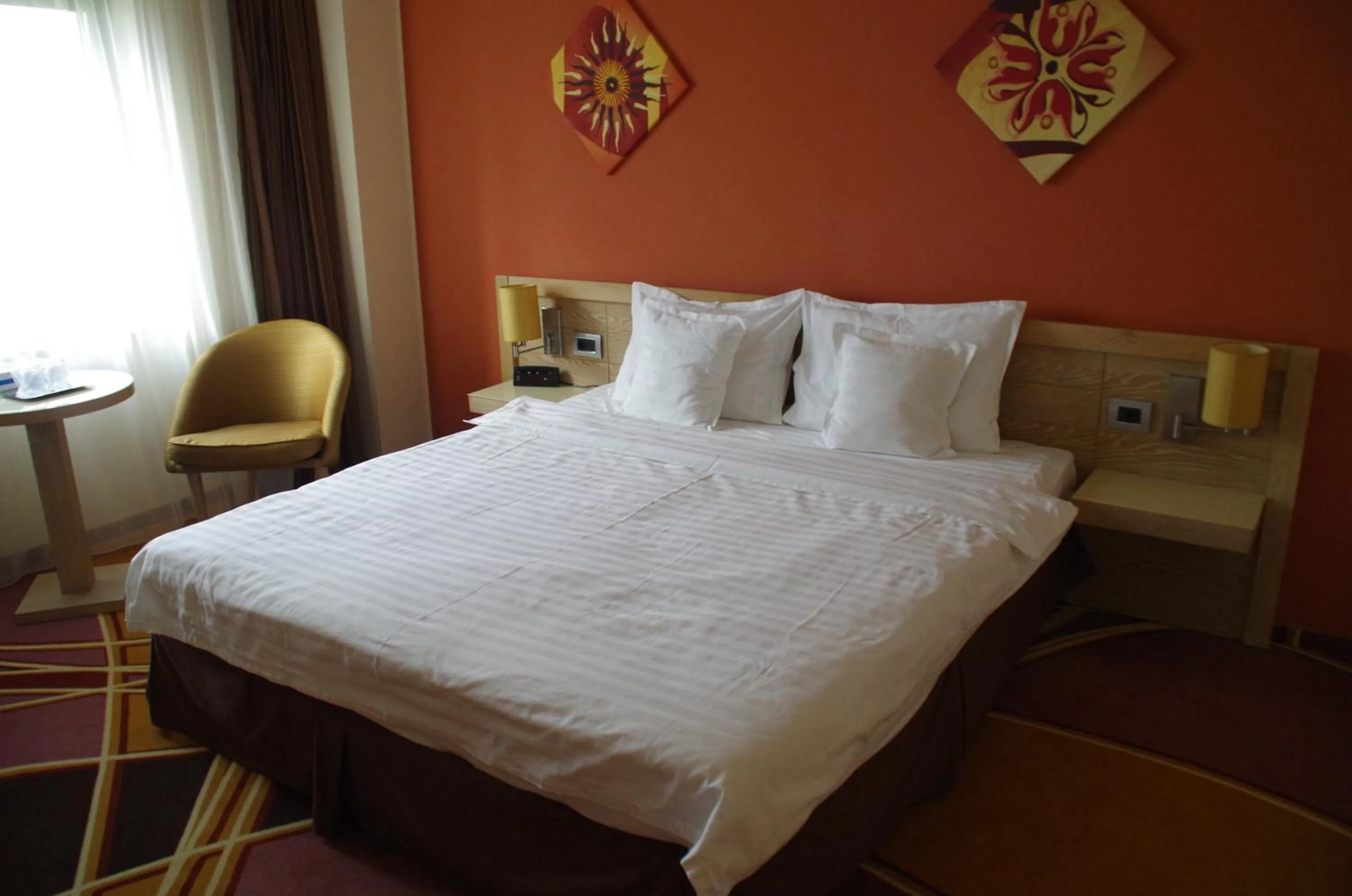 Bed in Mari Vila Hotel