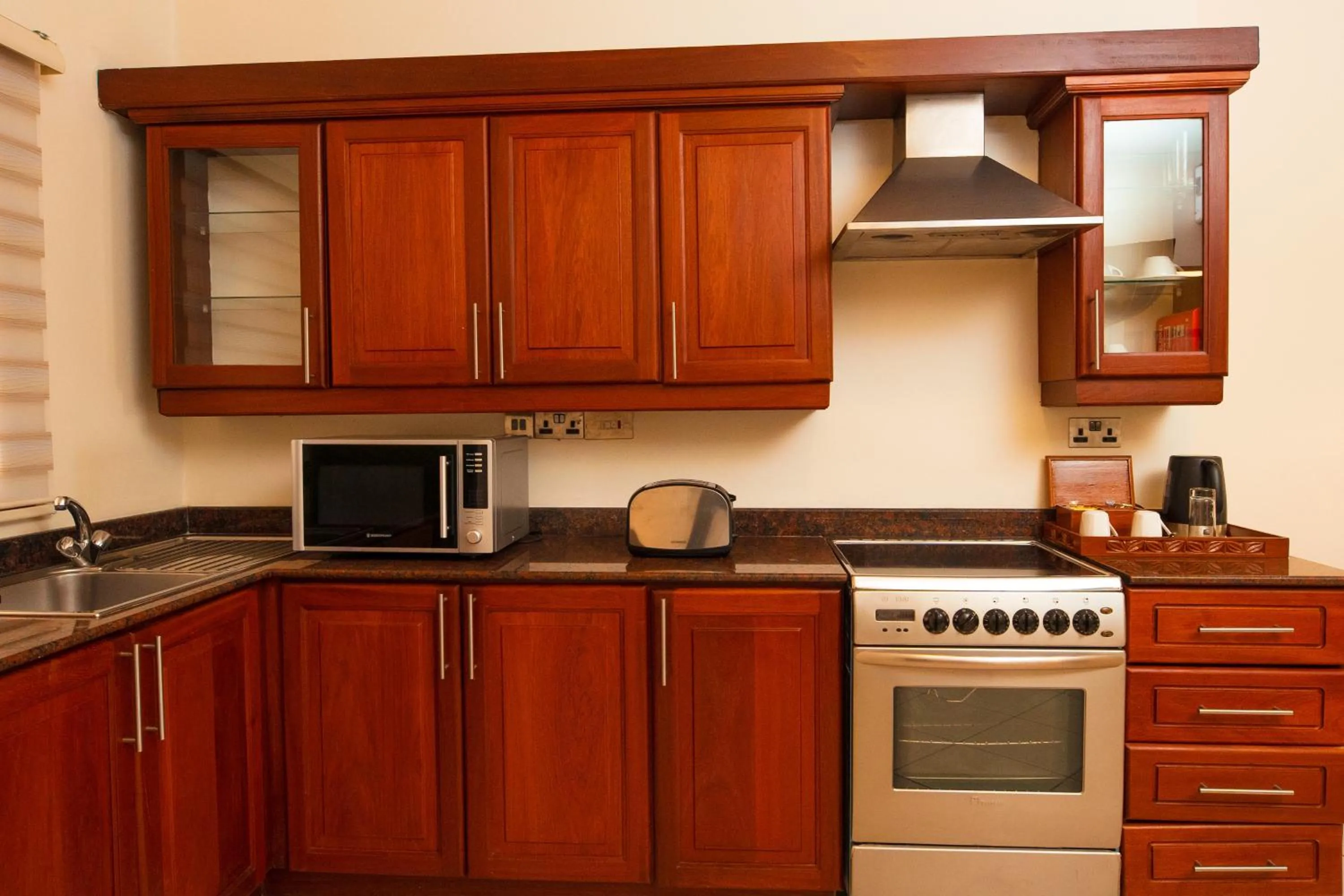 Kitchen or kitchenette in White Sands Hotel
