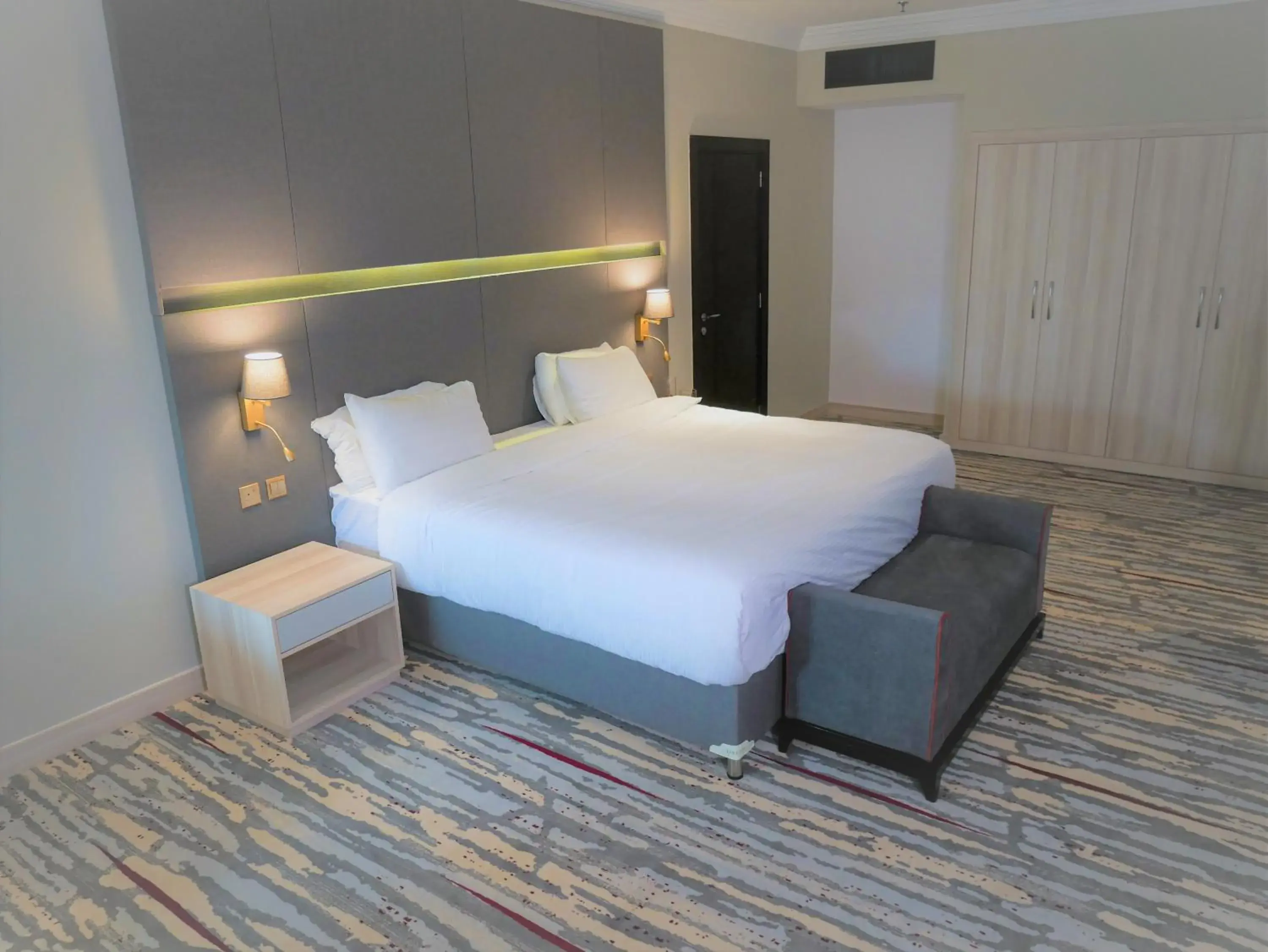 Bedroom in Ramada by Wyndham Doha Old Town Bedroom in Ramada by Wyndham Doha Old Town