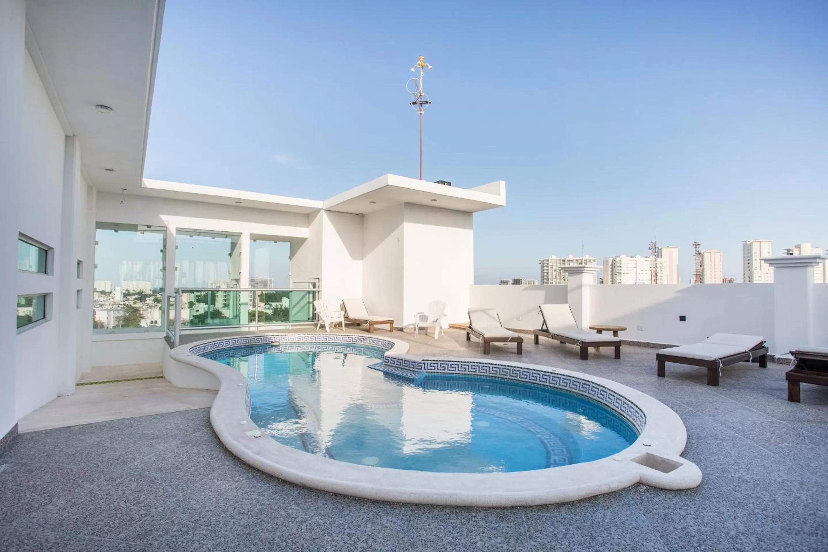 Swimming Pool in Capital O Cancun Ocean View, Cancún