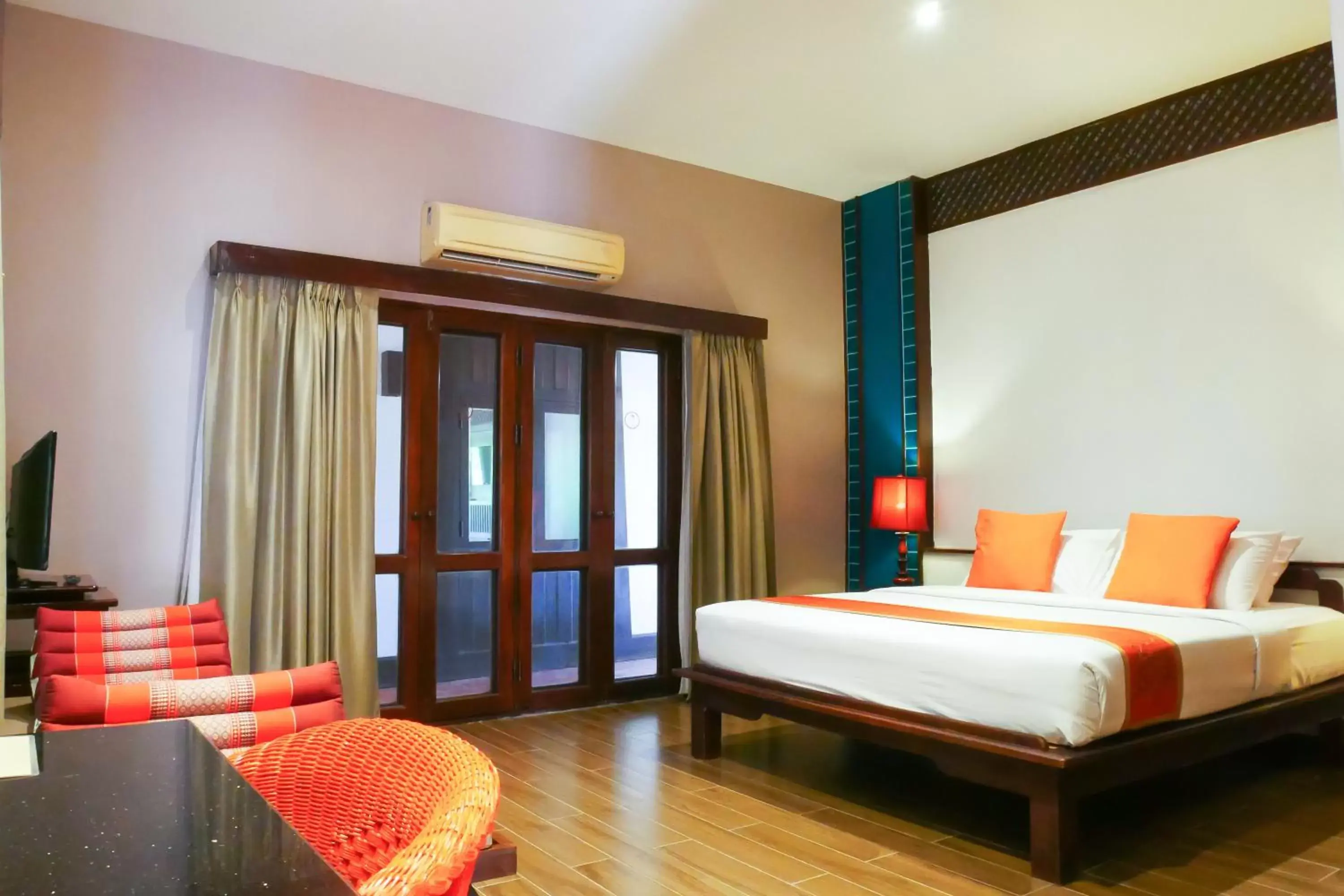 Photo of the whole room, Bed in Legendha Sukhothai Hotel - SHA certified