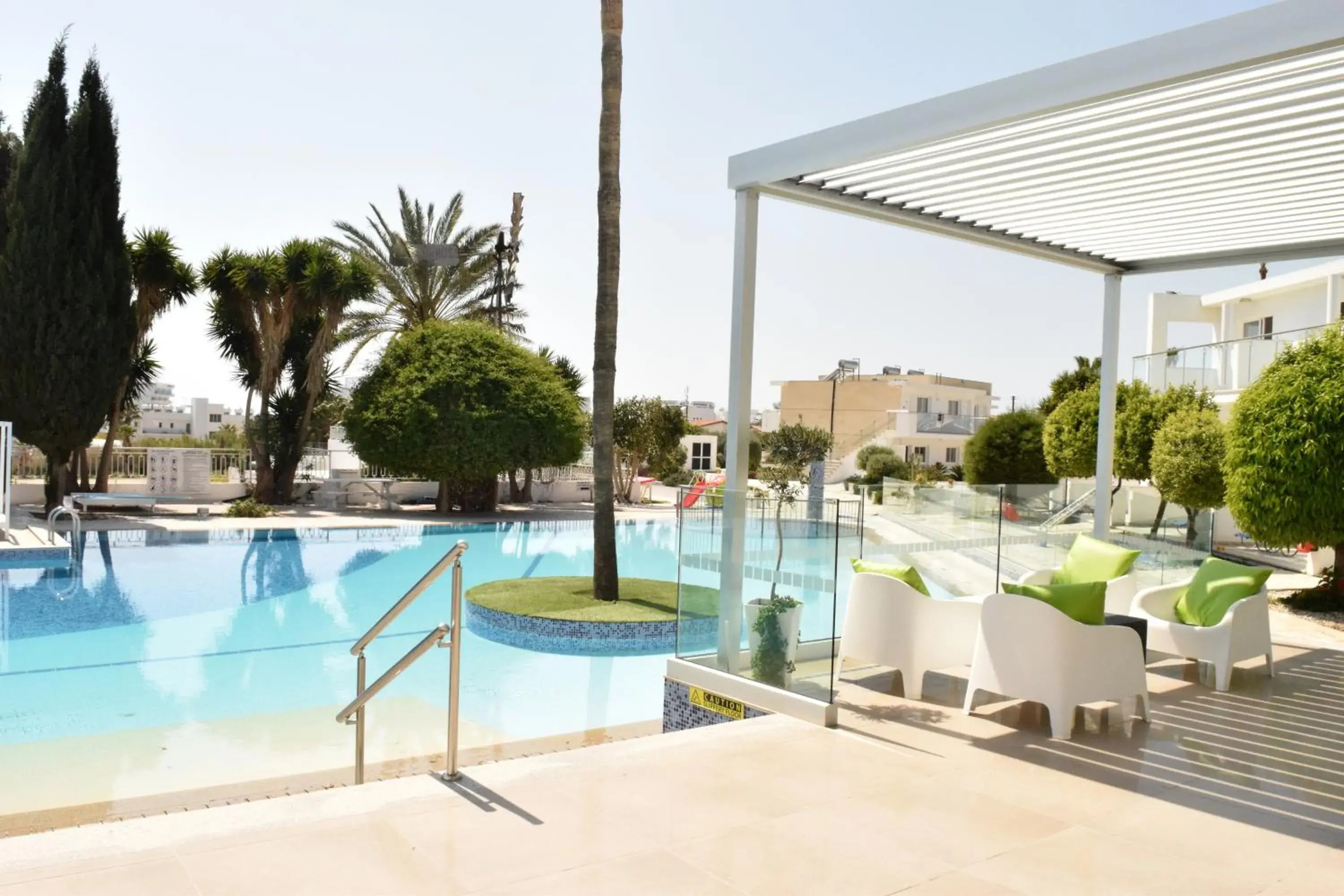 Patio, Swimming Pool in Fedrania Gardens Hotel