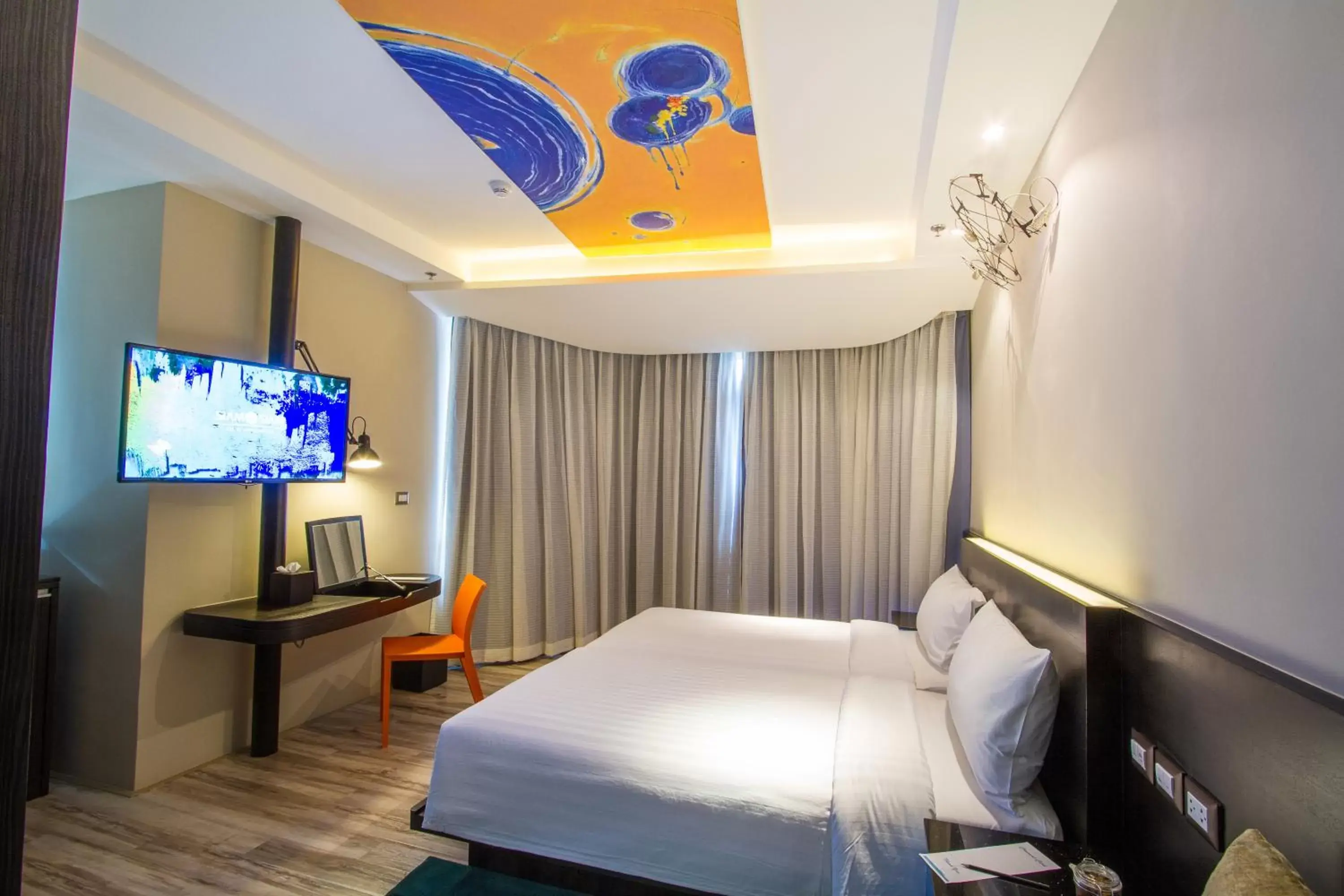 Bed, TV/Entertainment Center in Siam@Siam Design Hotel Pattaya