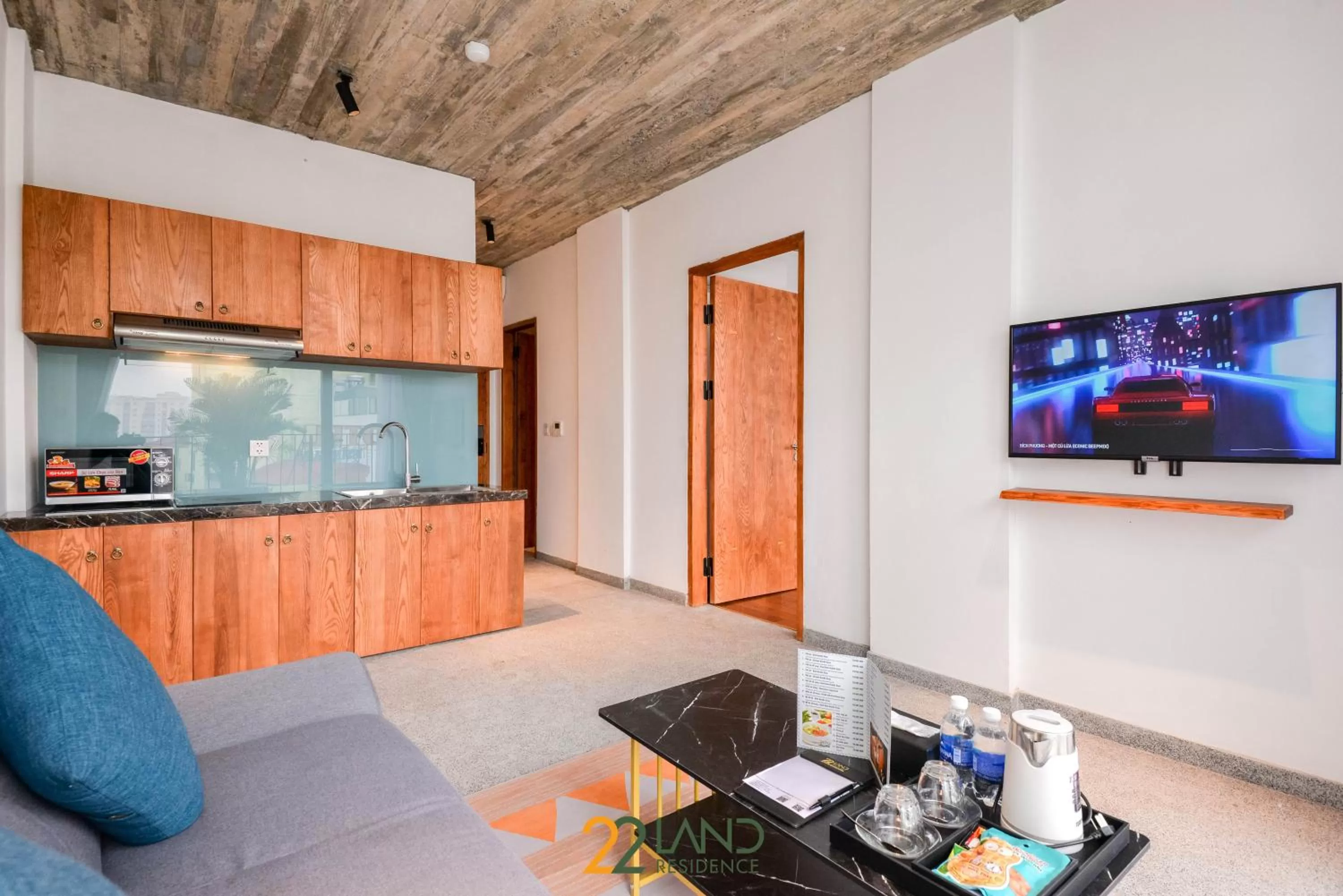 Communal lounge/ TV room in 22Land Hotel & Residence