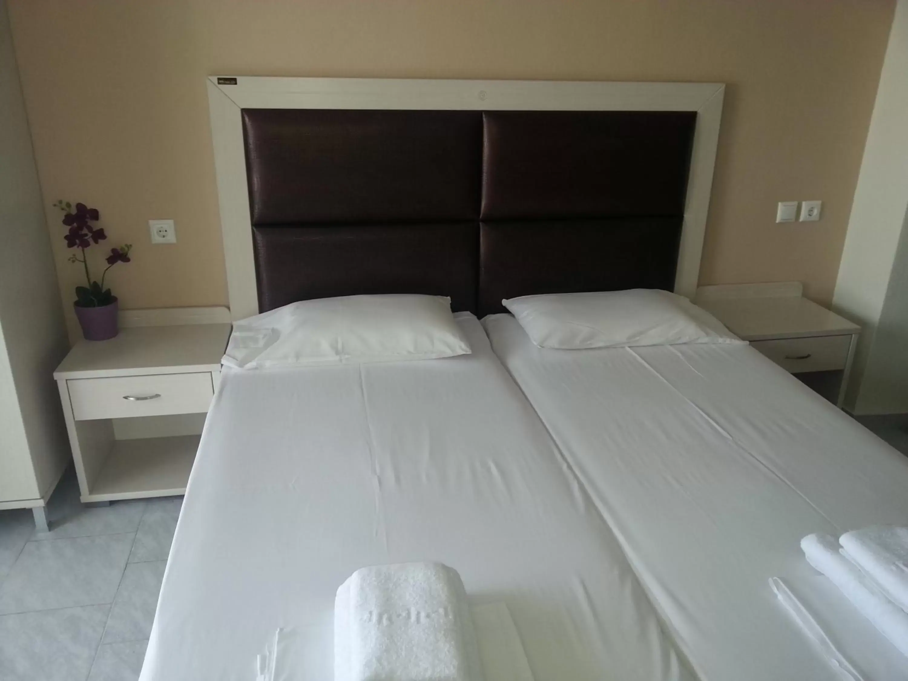 Bed in Alexandros Hotel