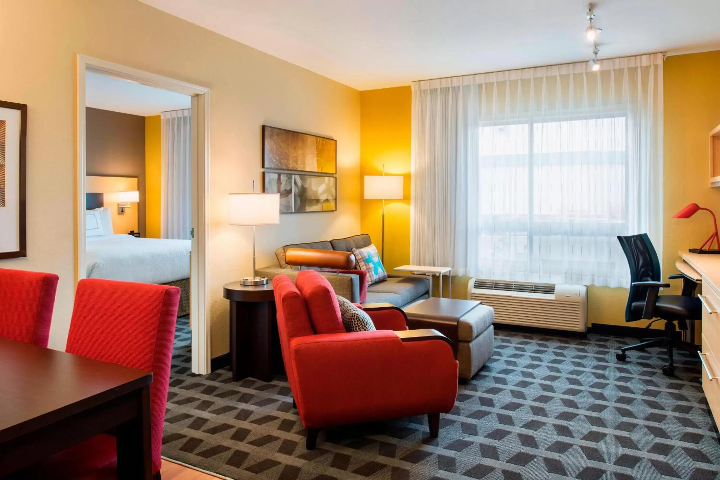 Bedroom, Seating Area in TownePlace Suites by Marriott Red Deer