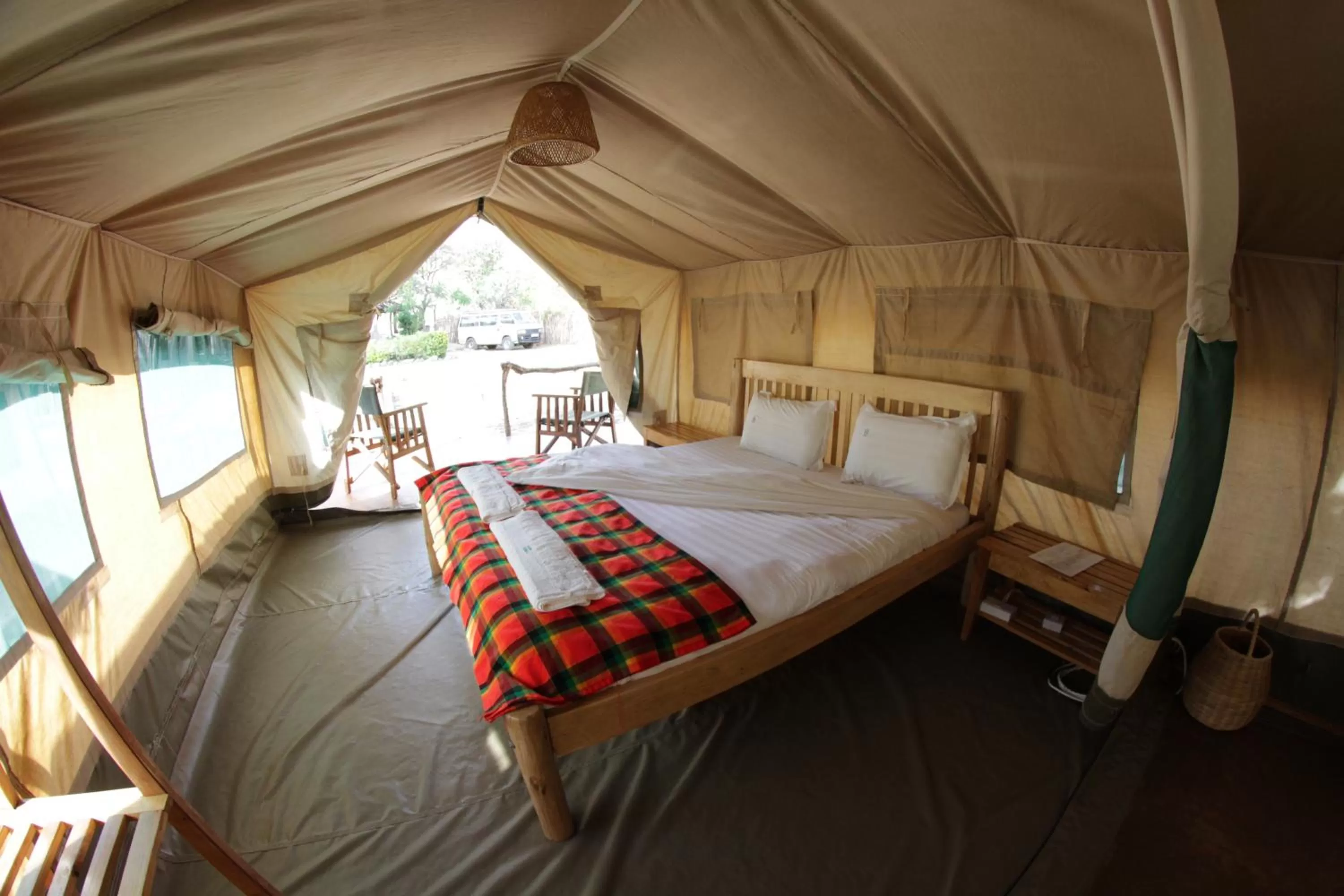 Bed in Kara-Tunga Safari Camp