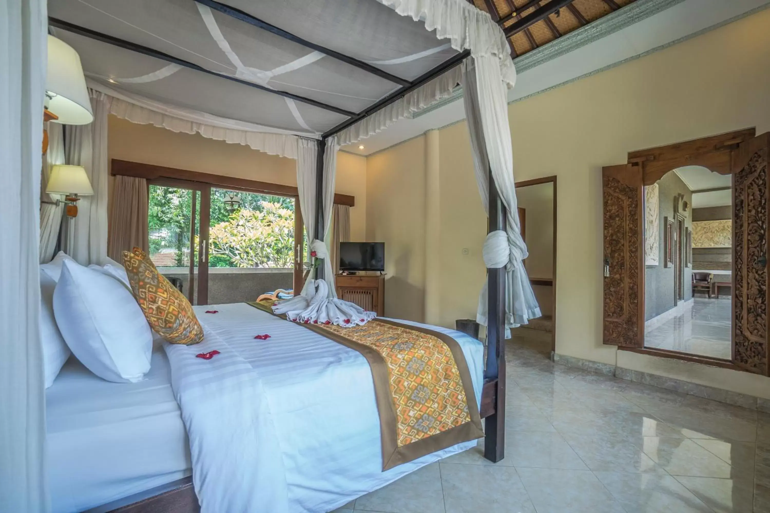 Bedroom in Cendana Resort & Spa by Mahaputra