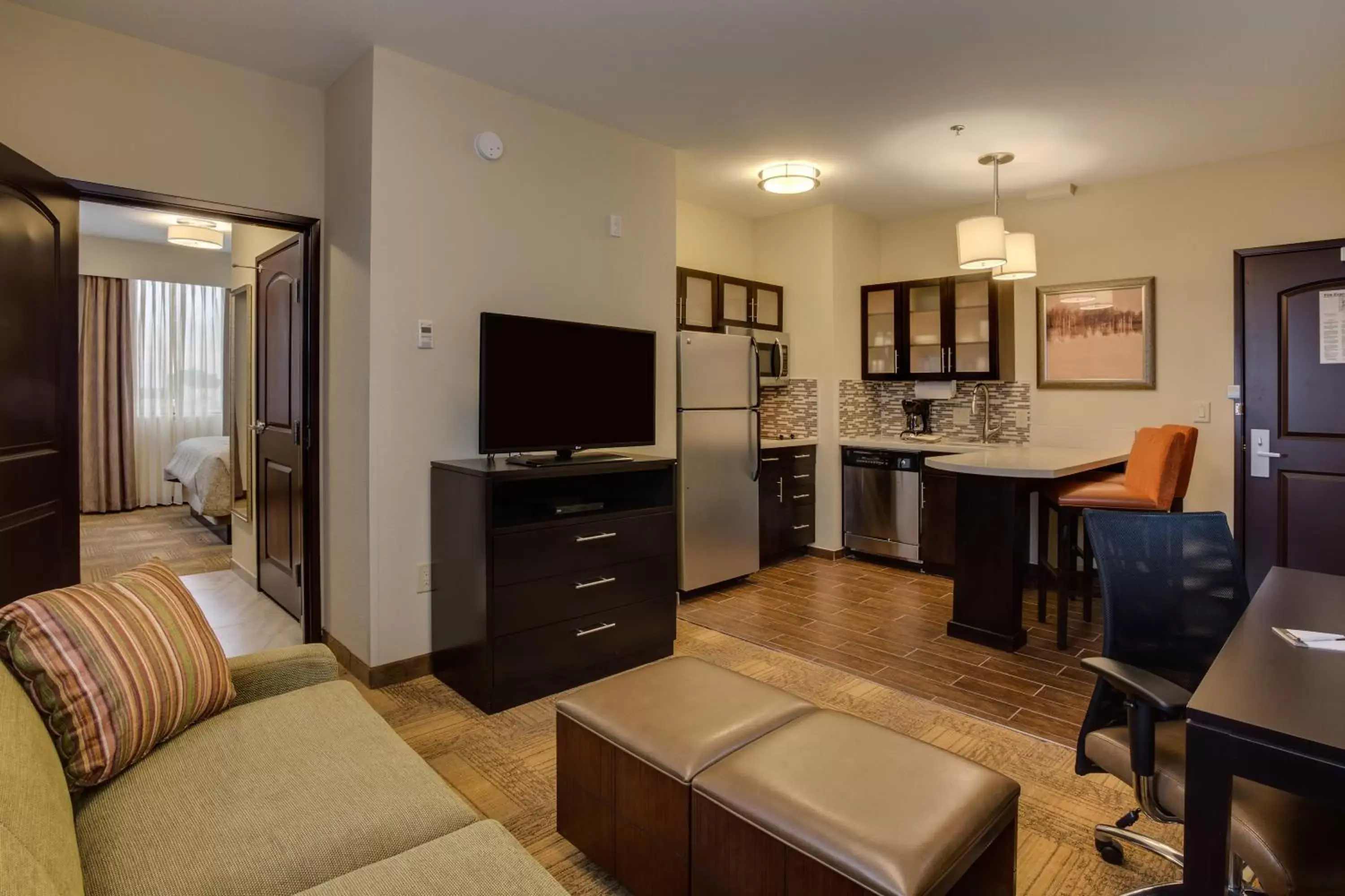 Living room, Seating Area in Staybridge Suites Dearborn, an IHG Hotel