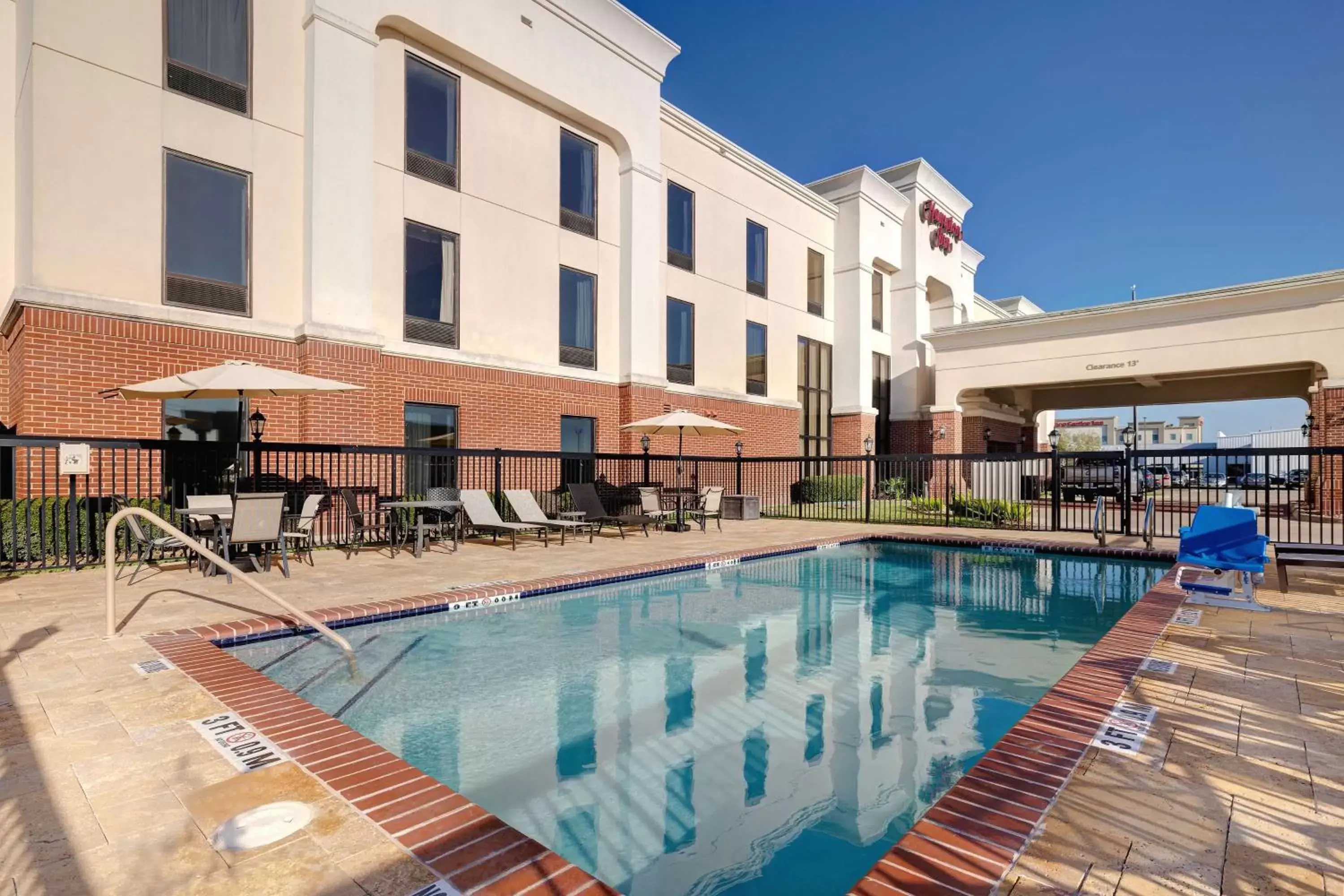 Pool view, Property Building in Hampton Inn Victoria