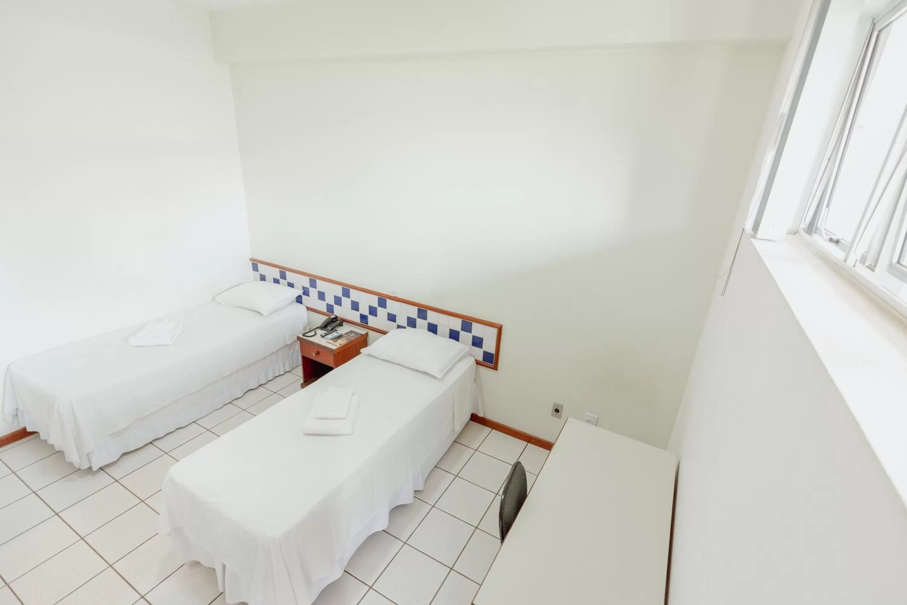 Bed in Hotel Metropolitano