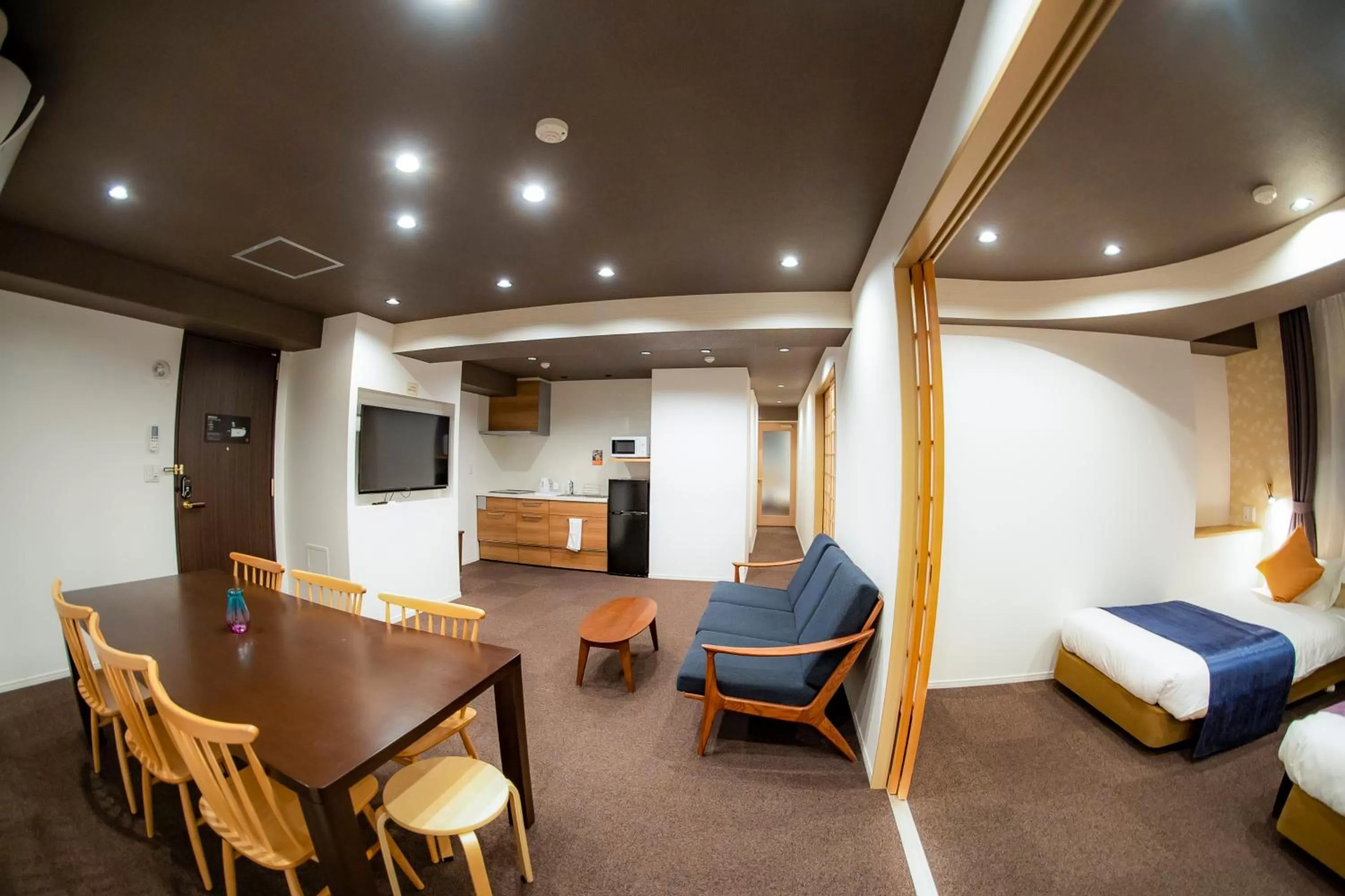 Living room, Bed in Hotel S-Presso Central