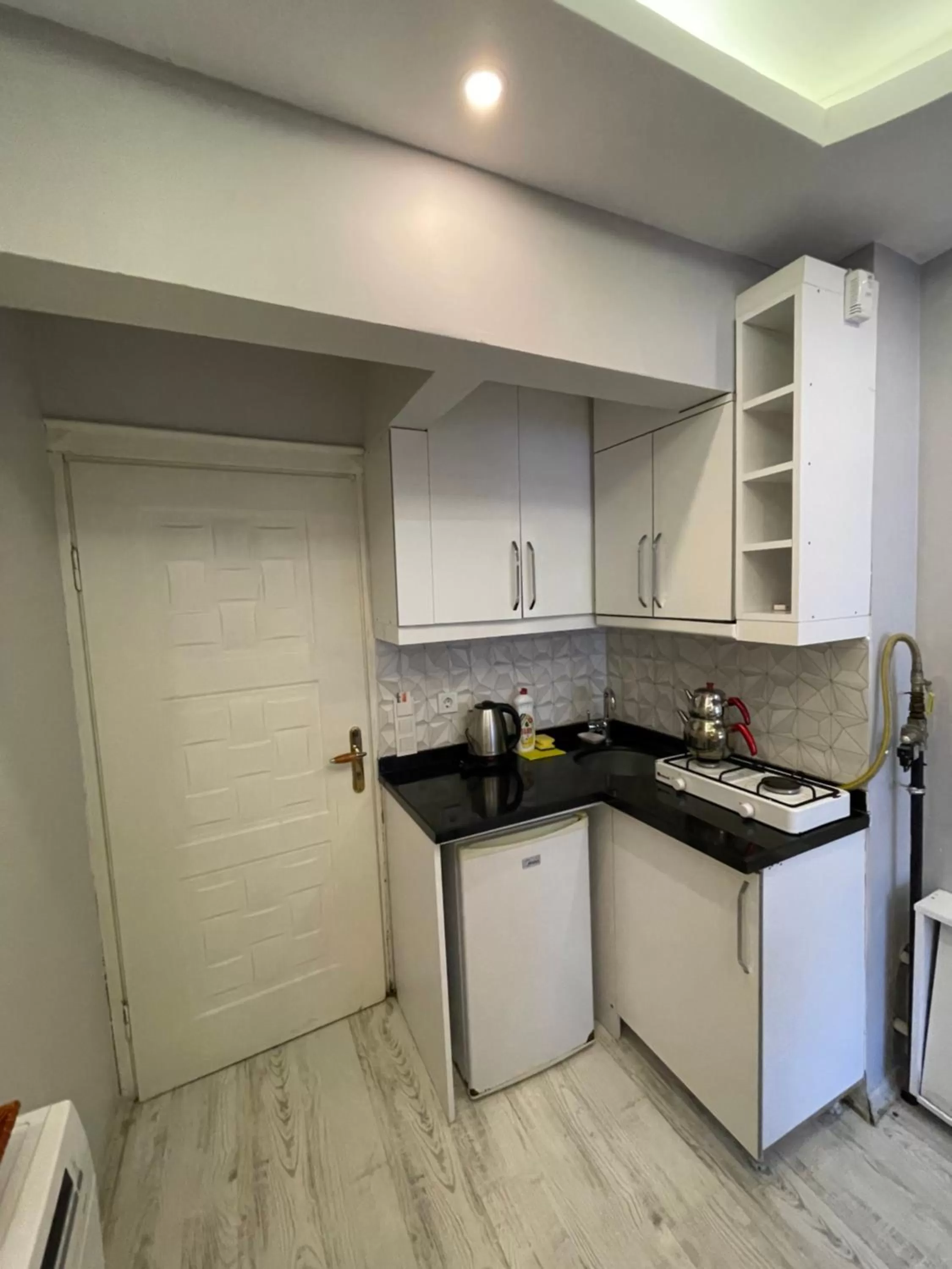 Kitchen or kitchenette in Arat Apartments