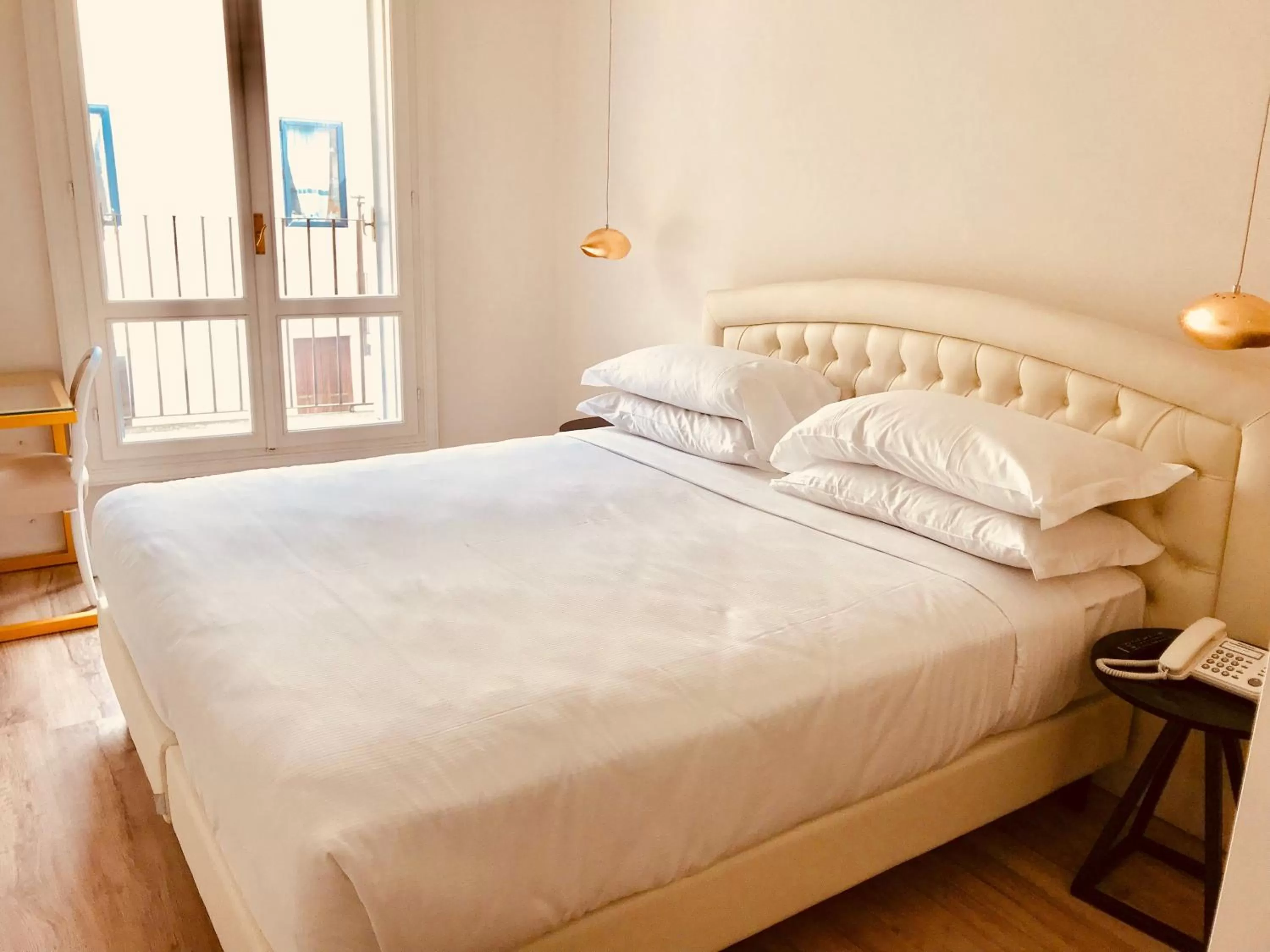 Bed in Palazzo Otello 1847 Wellness & Spa