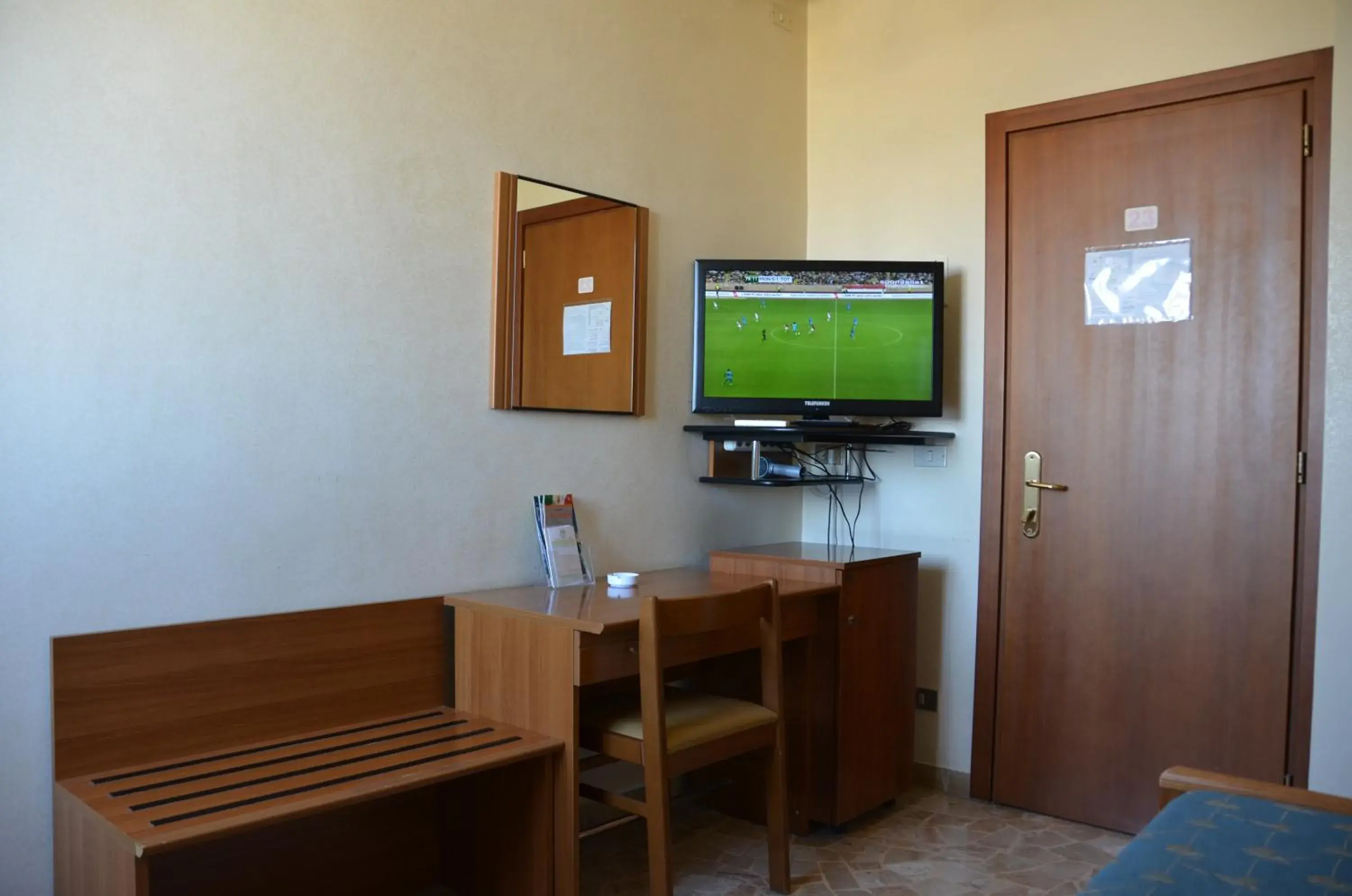 Bedroom, TV/Entertainment Center in Hotel A-14