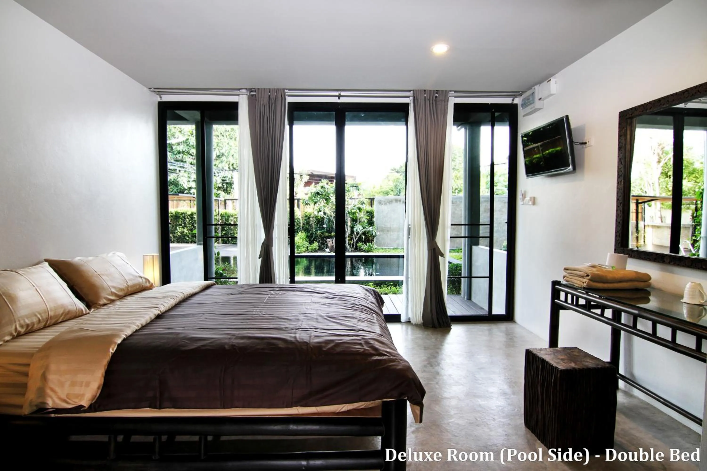 Bed in Lamphu House Chiang Mai